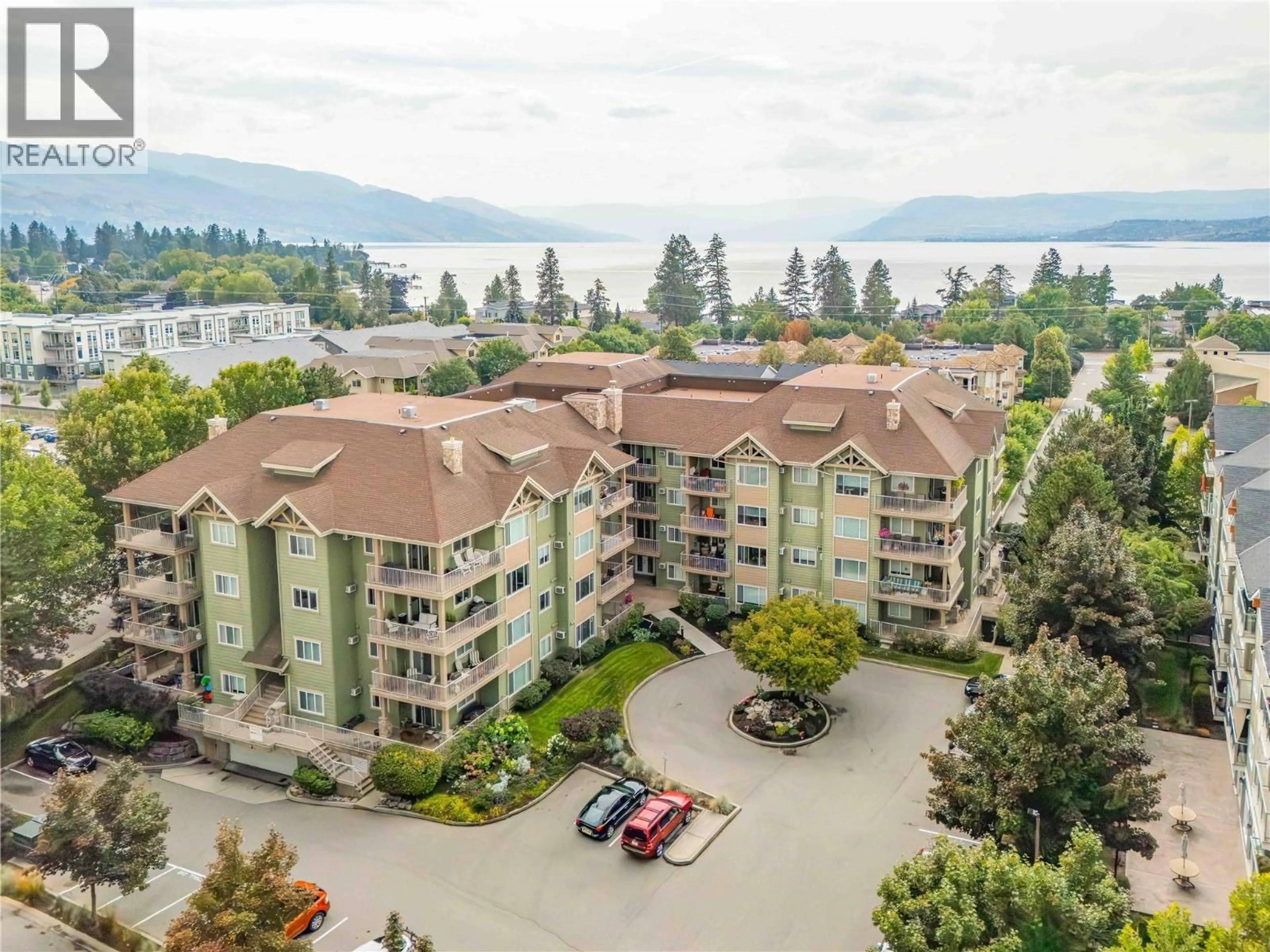 A pic from outside/outdoor area/front of a property/back of a property/a pic from drone, water/lake/river/ocean view for 406 - 680 LEQUIME ROAD, Kelowna British Columbia V1W1A4