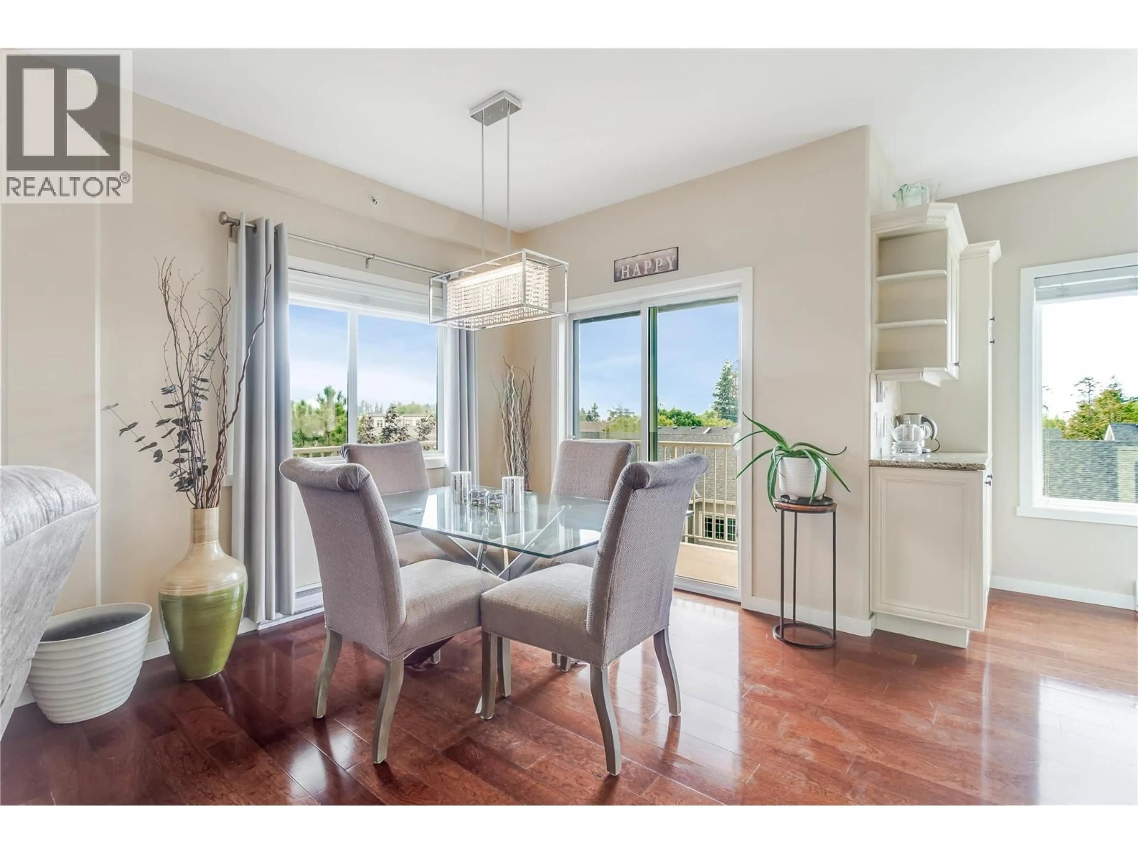 Dining room, wood/laminate floor for 406 - 680 LEQUIME ROAD, Kelowna British Columbia V1W1A4