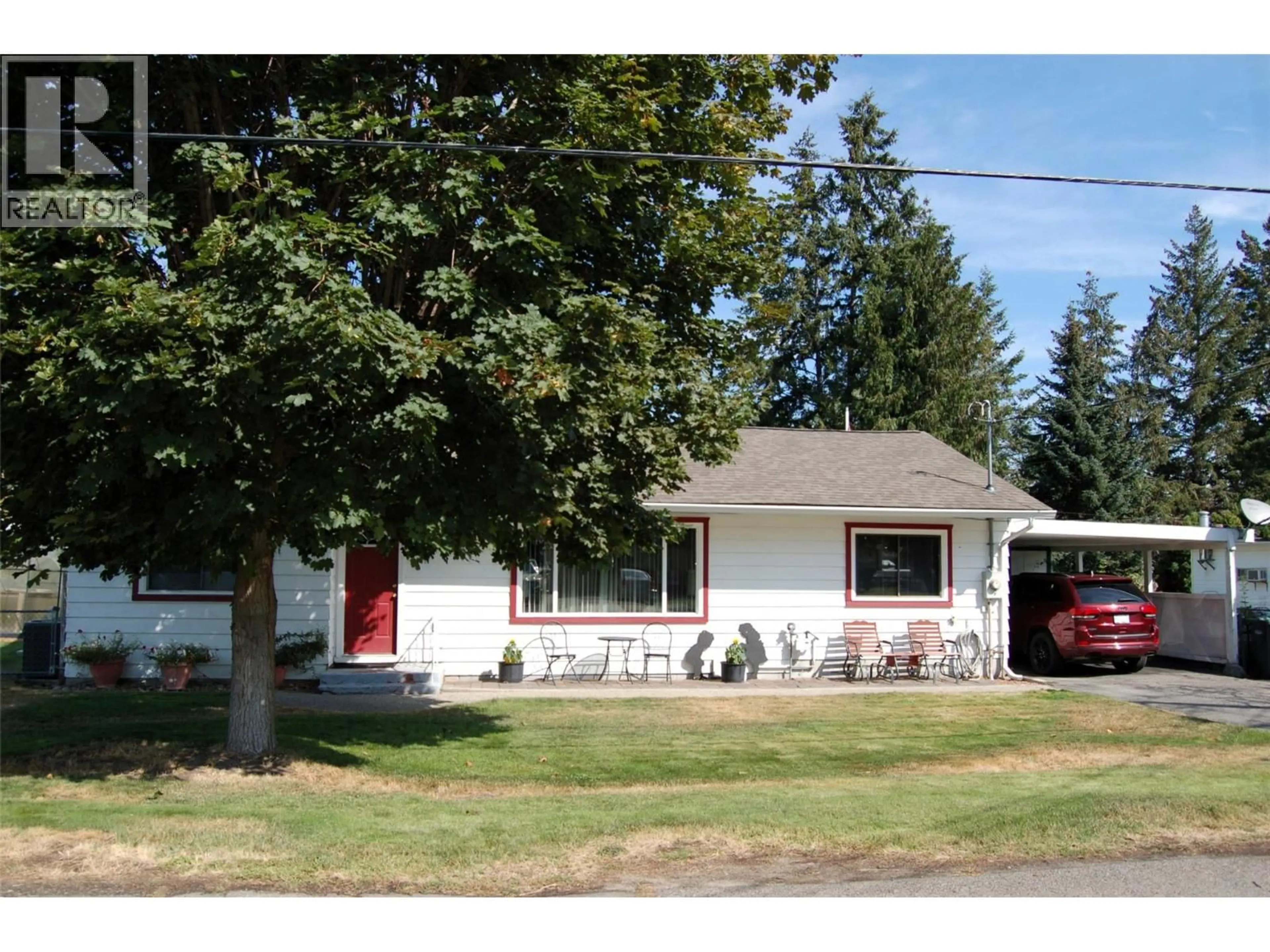 Home with vinyl exterior material, street for 10504 RITCHIE STREET, Summerland British Columbia V0H1Z5