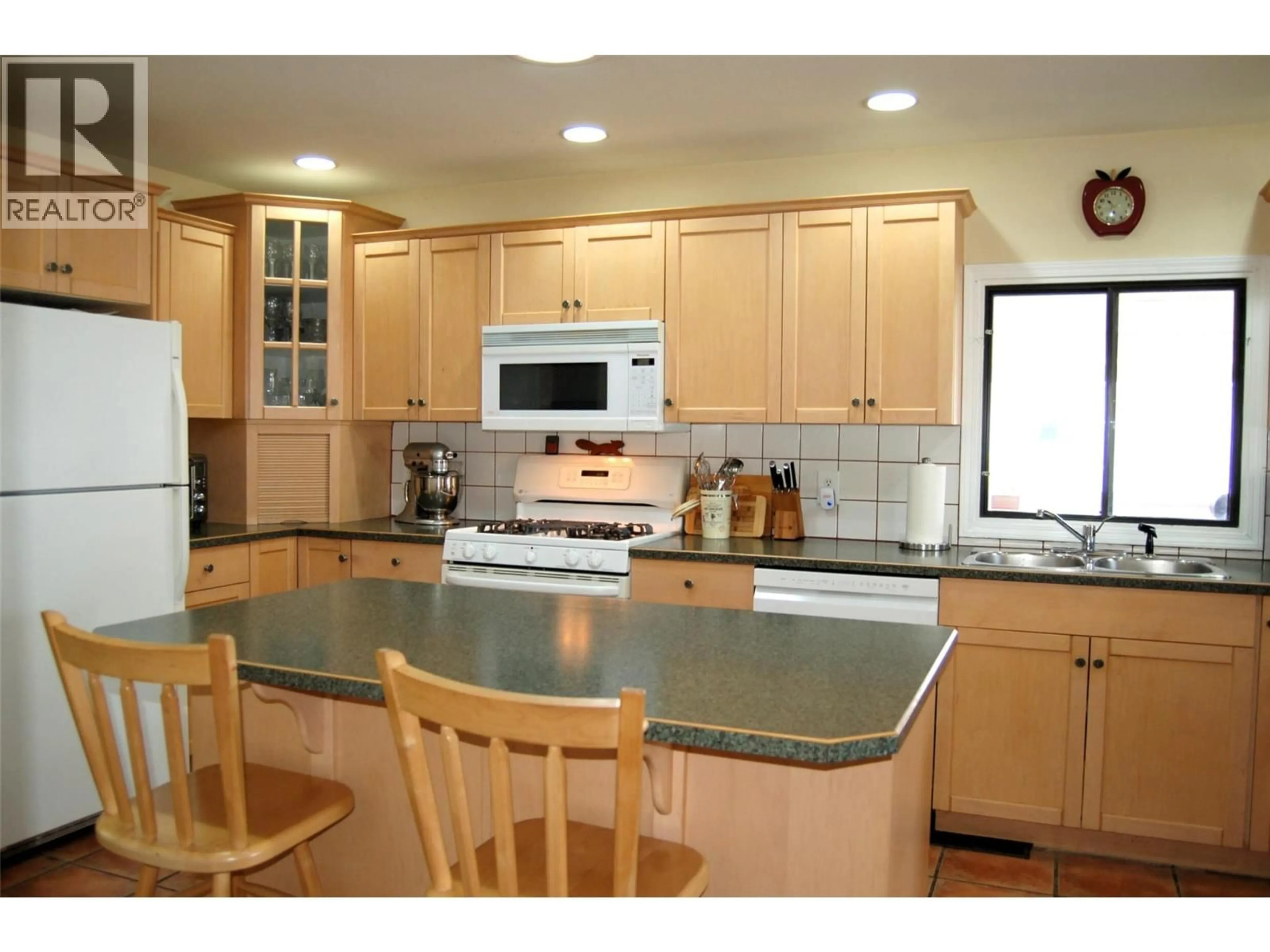 Standard kitchen, ceramic/tile floor for 10504 RITCHIE STREET, Summerland British Columbia V0H1Z5