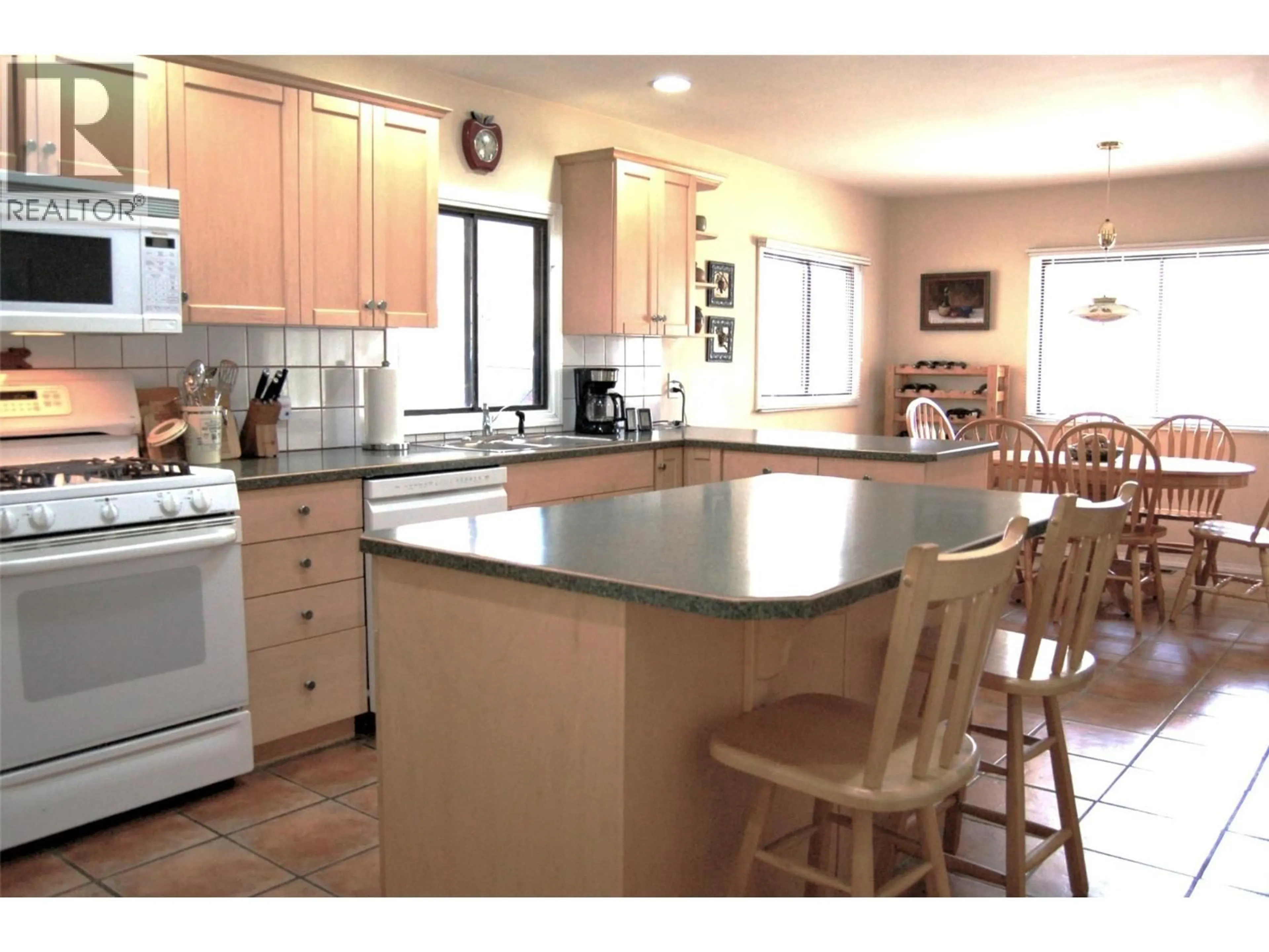 Open concept kitchen, ceramic/tile floor for 10504 RITCHIE STREET, Summerland British Columbia V0H1Z5