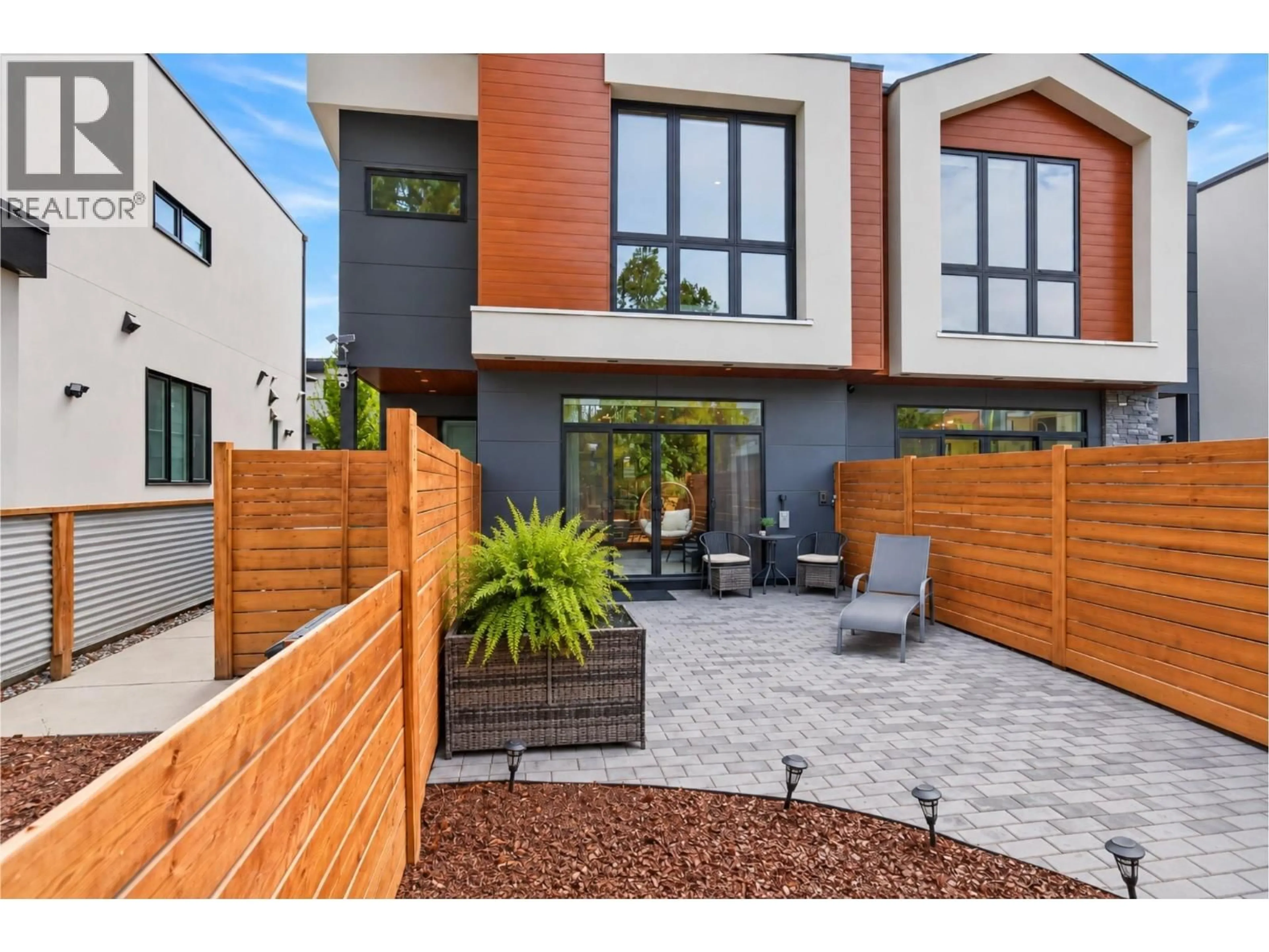 Home with brick exterior material, street for 4 - 845 LAWSON AVENUE, Kelowna British Columbia V1Y6S9