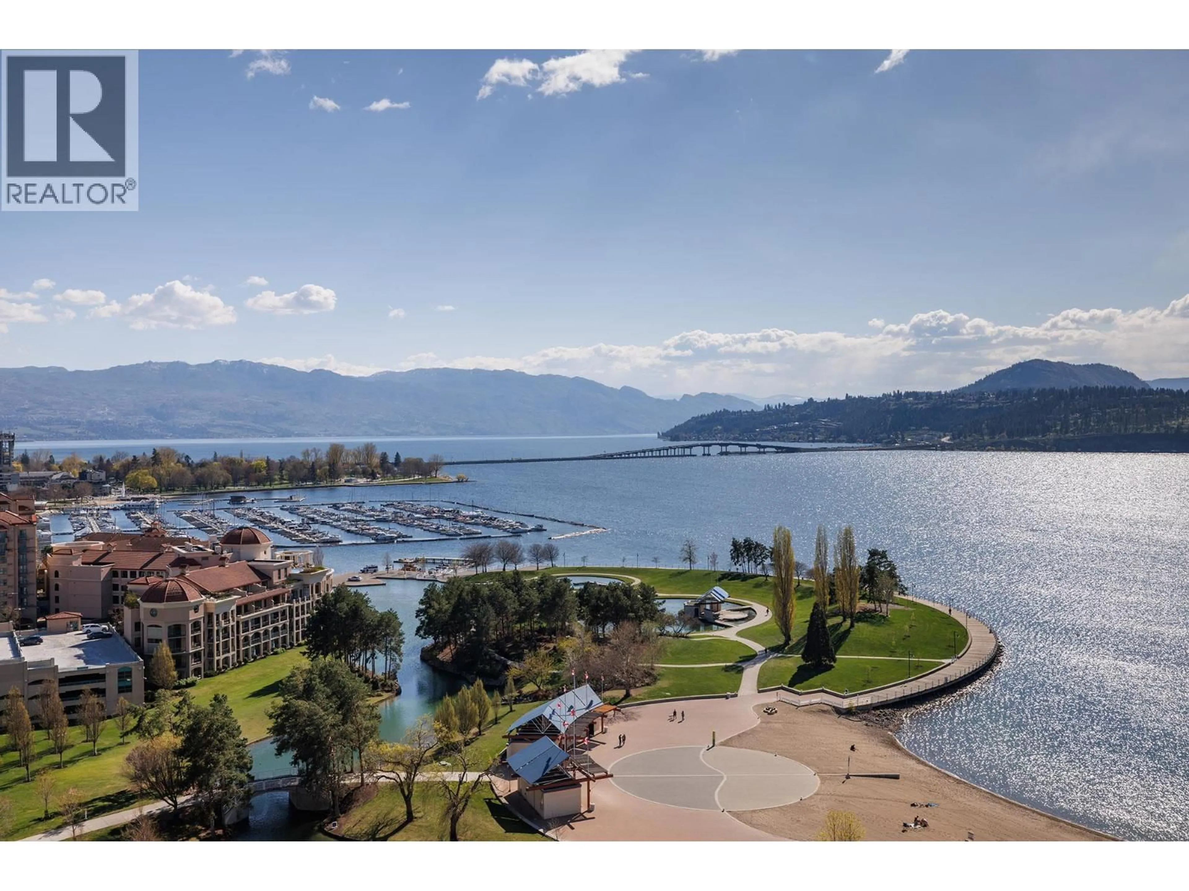 A pic from outside/outdoor area/front of a property/back of a property/a pic from drone, water/lake/river/ocean view for 1702 - 1128 SUNSET DRIVE, Kelowna British Columbia V1Y9W7