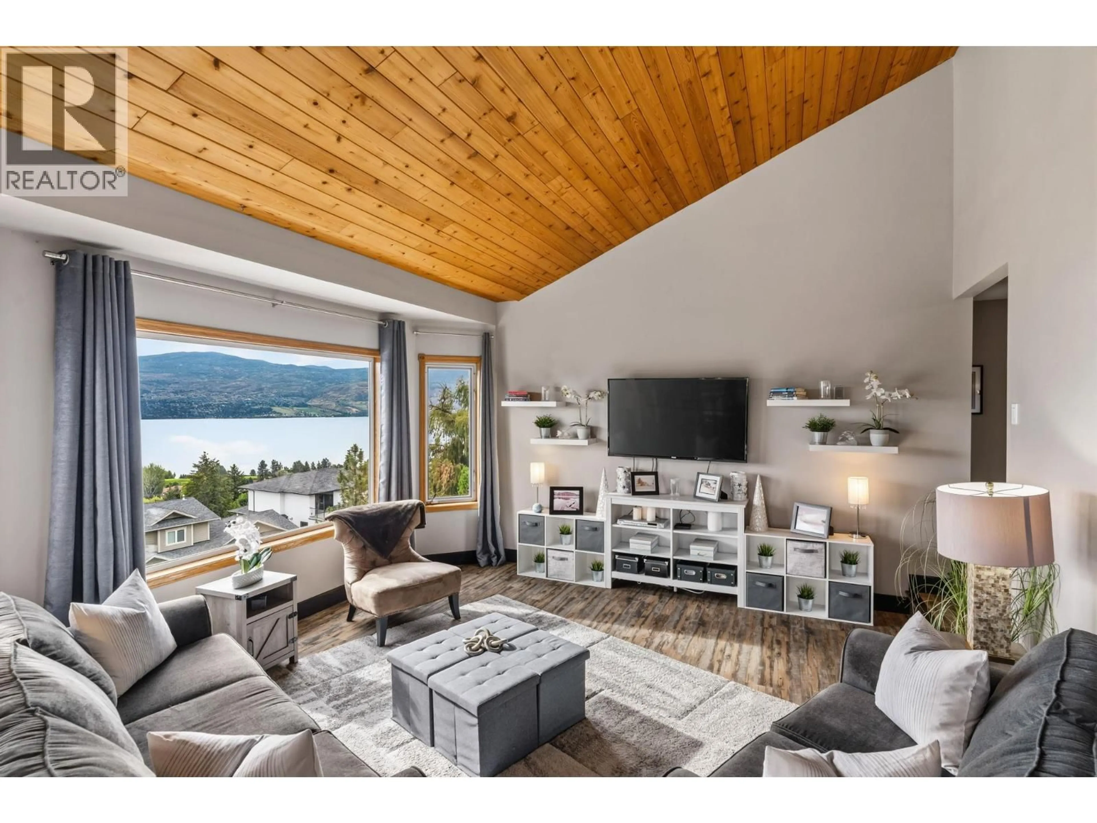Living room with furniture, wood/laminate floor for 1108 MENU ROAD, West Kelowna British Columbia V1Z2J5