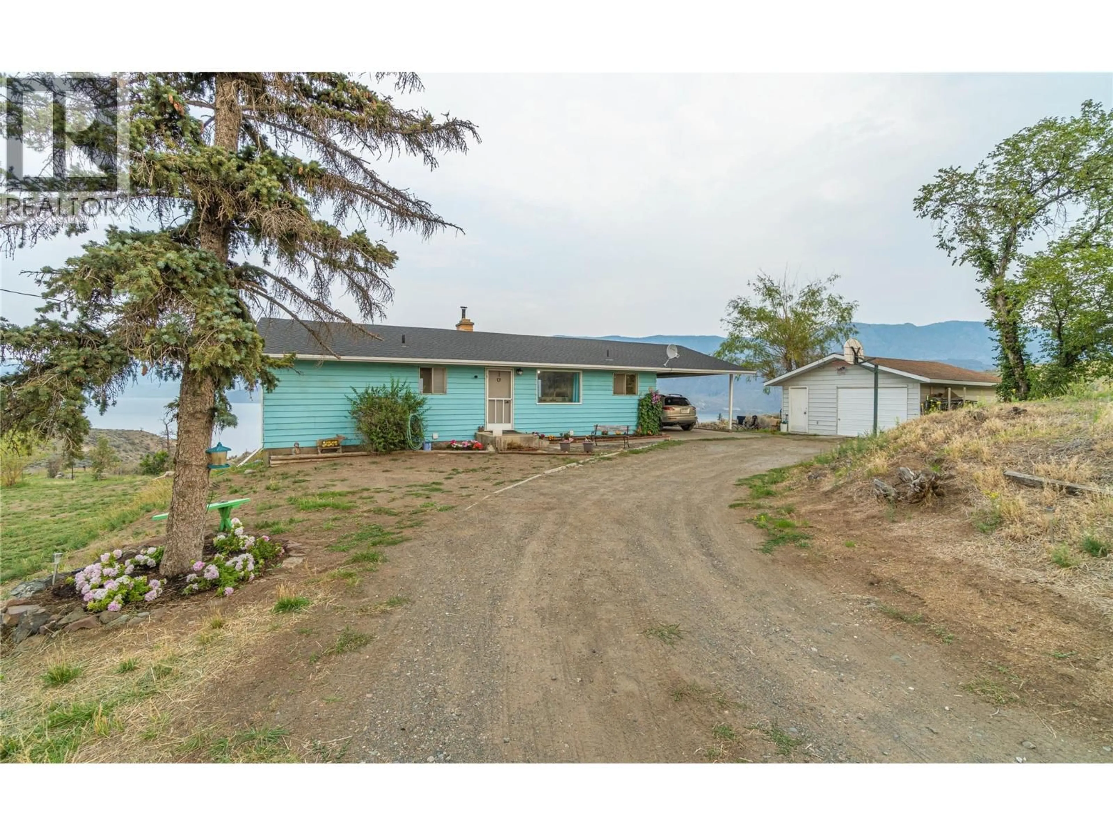 A pic from outside/outdoor area/front of a property/back of a property/a pic from drone, mountain view for 6009 WEST TRANS CANADA HIGHWAY, Kamloops British Columbia V1S2A2