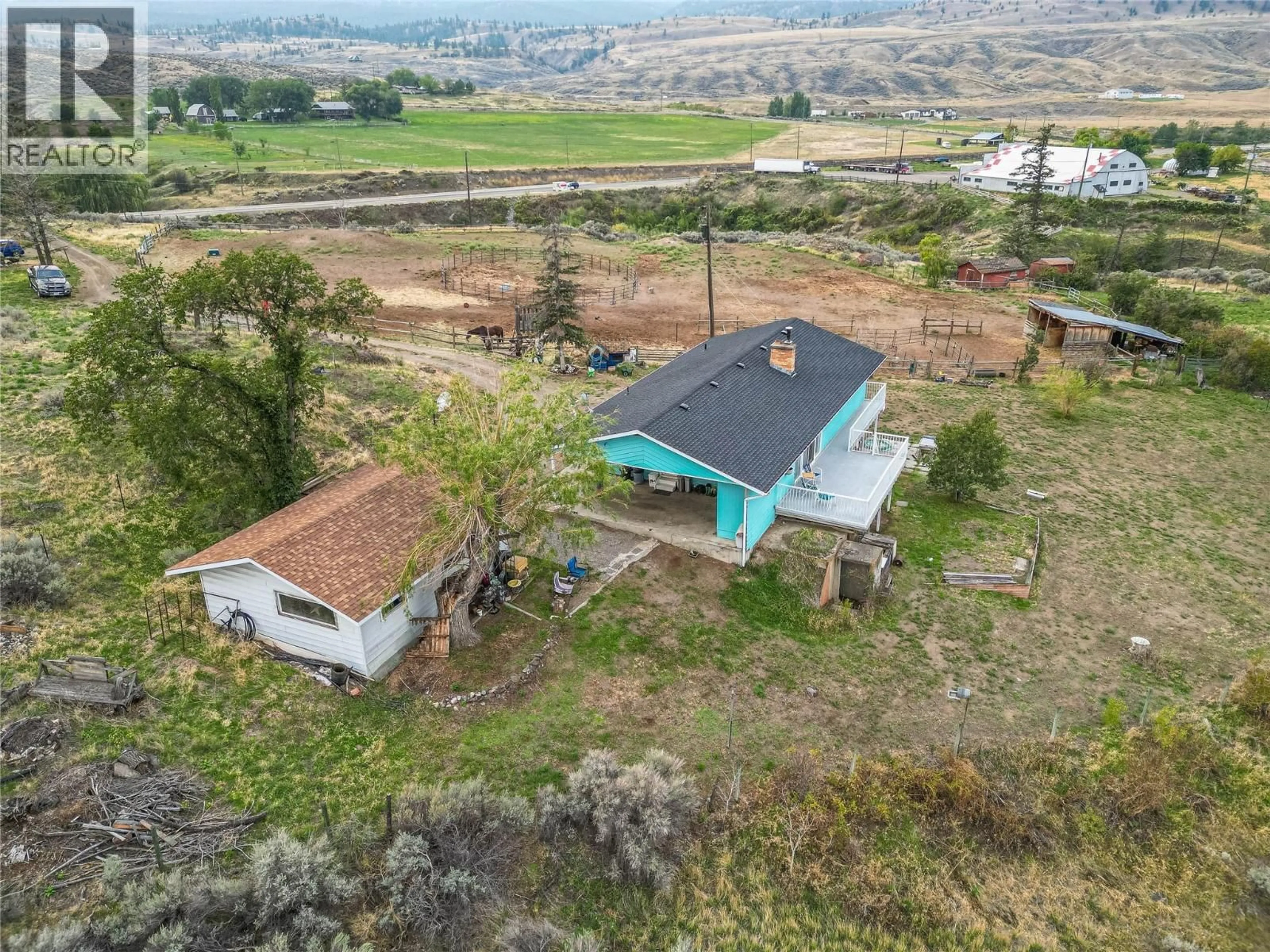 A pic from outside/outdoor area/front of a property/back of a property/a pic from drone, mountain view for 6009 WEST TRANS CANADA HIGHWAY, Kamloops British Columbia V1S2A2