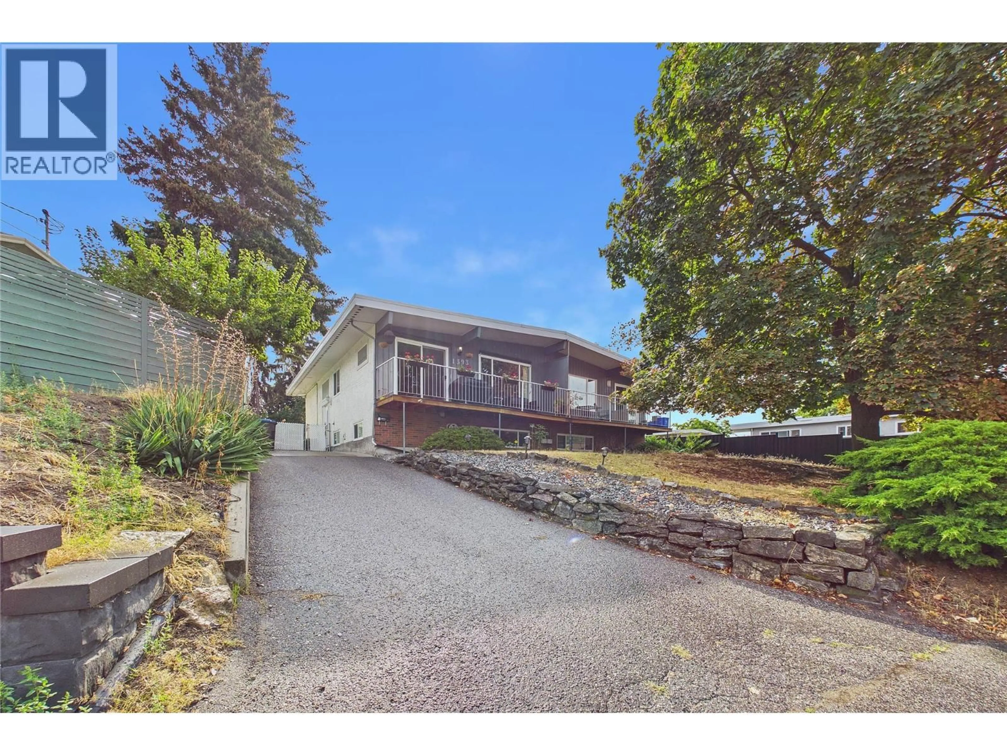 A pic from outside/outdoor area/front of a property/back of a property/a pic from drone, street for 1393 HIGHLAND DRIVE SOUTH, Kelowna British Columbia V1Y3W2
