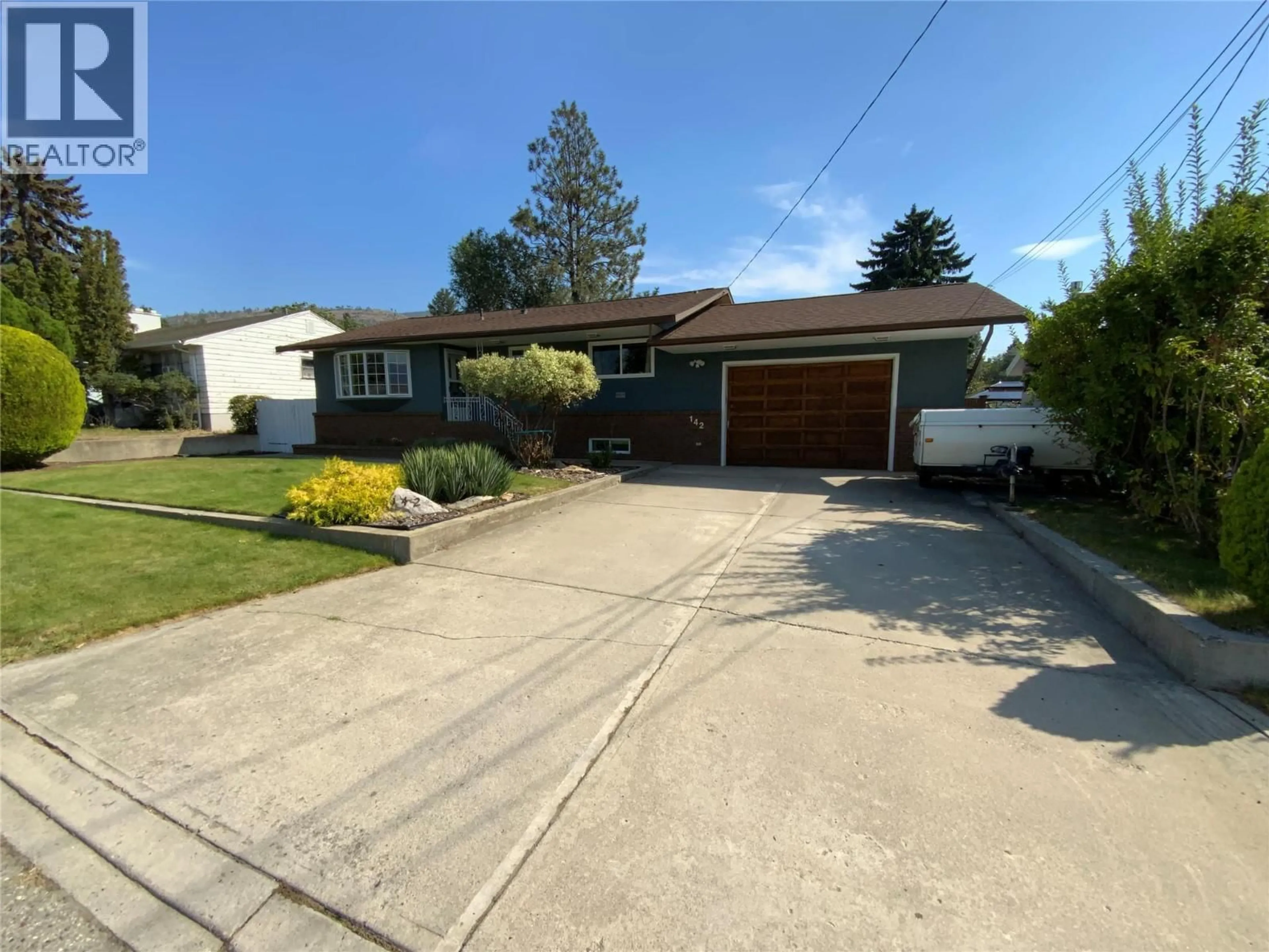A pic from outside/outdoor area/front of a property/back of a property/a pic from drone, street for 142 SECREST PLACE, Penticton British Columbia V2A3R3