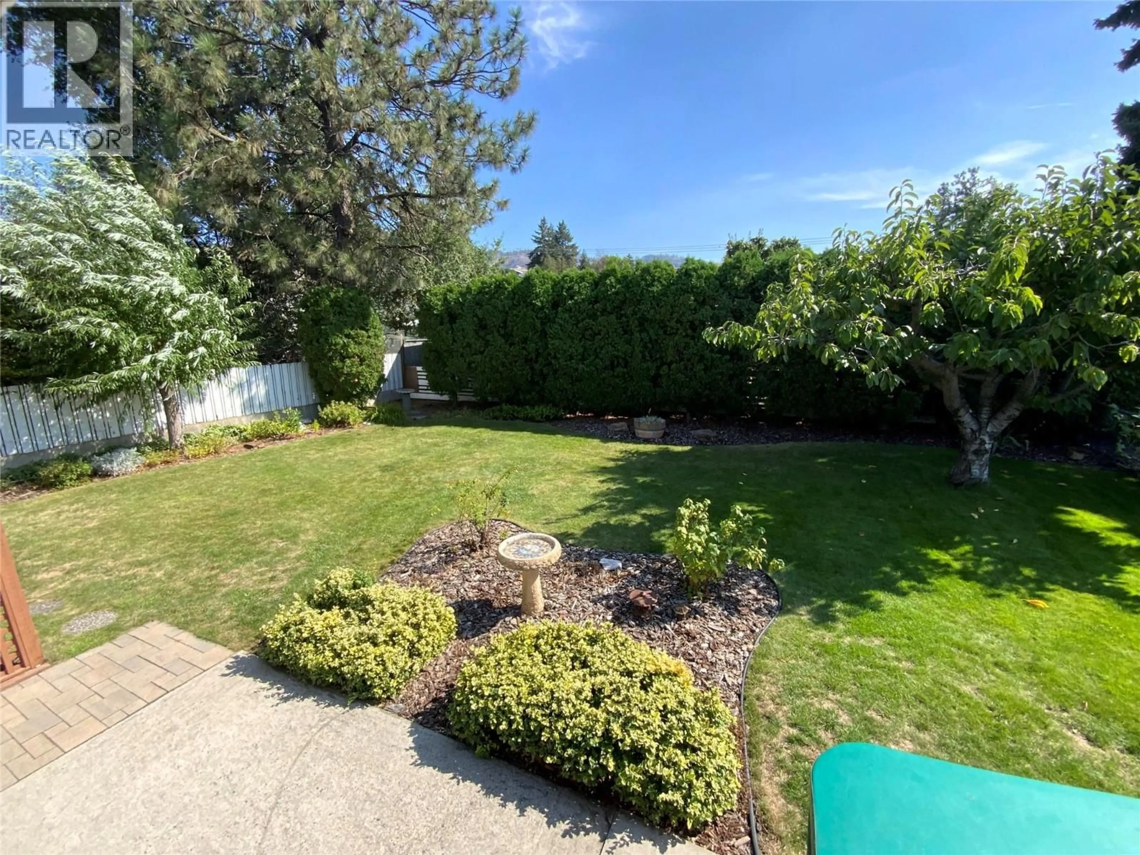 A pic from outside/outdoor area/front of a property/back of a property/a pic from drone, unknown for 142 SECREST PLACE, Penticton British Columbia V2A3R3