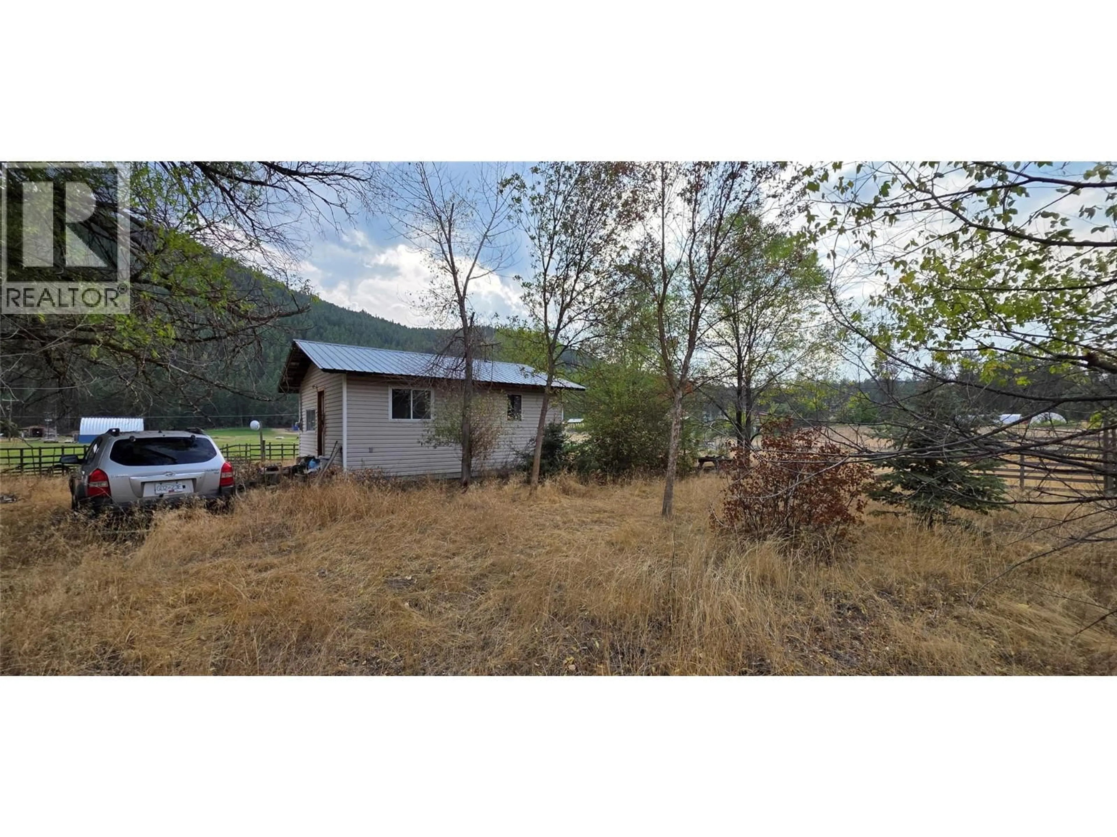 A pic from outside/outdoor area/front of a property/back of a property/a pic from drone, unknown for 3580 HIGHWAY 3 OTHER, Rock Creek British Columbia V0H1Y0