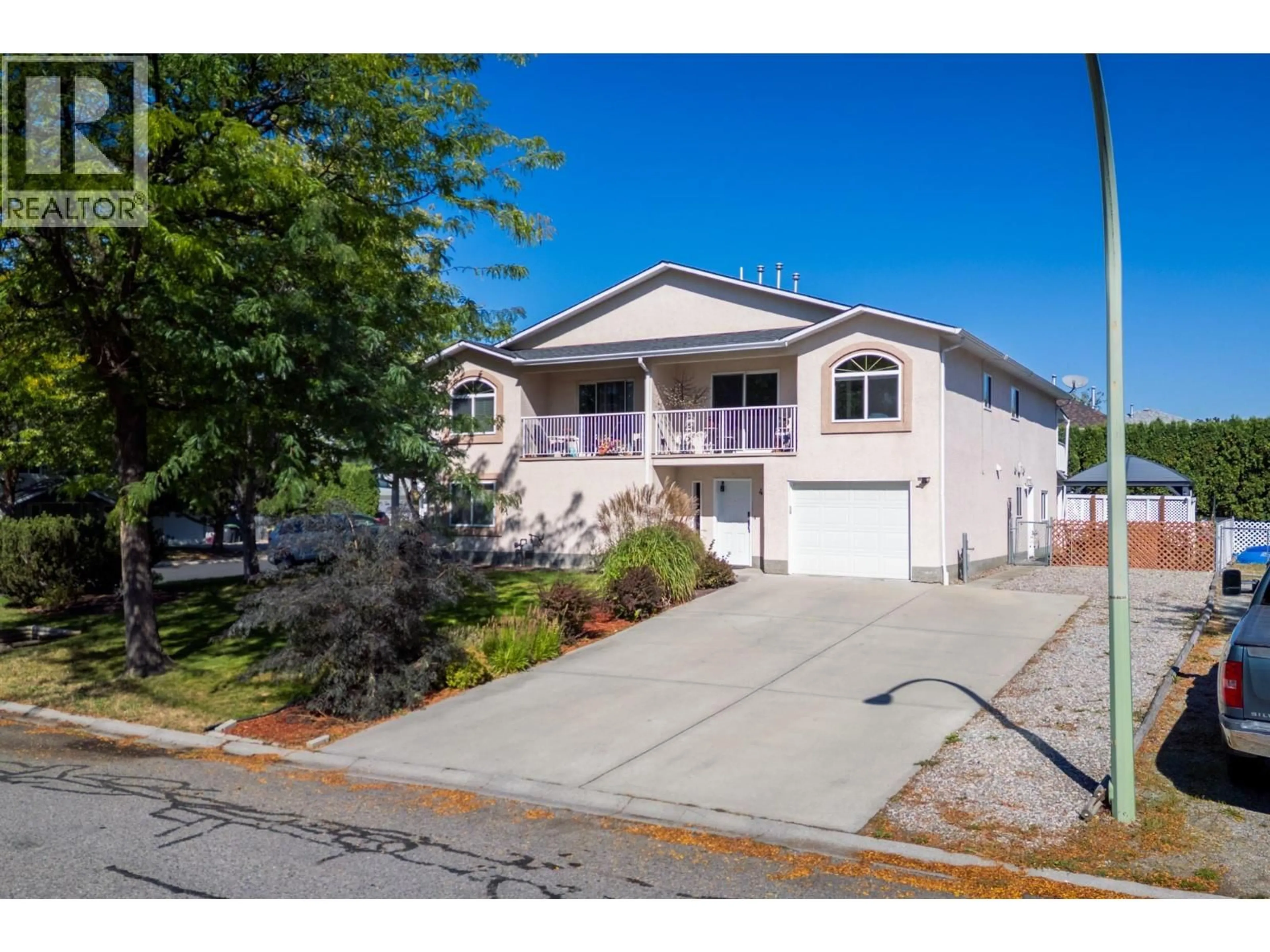 Home with vinyl exterior material, street for 416 SUMAC ROAD EAST, Kelowna British Columbia V1X7N2