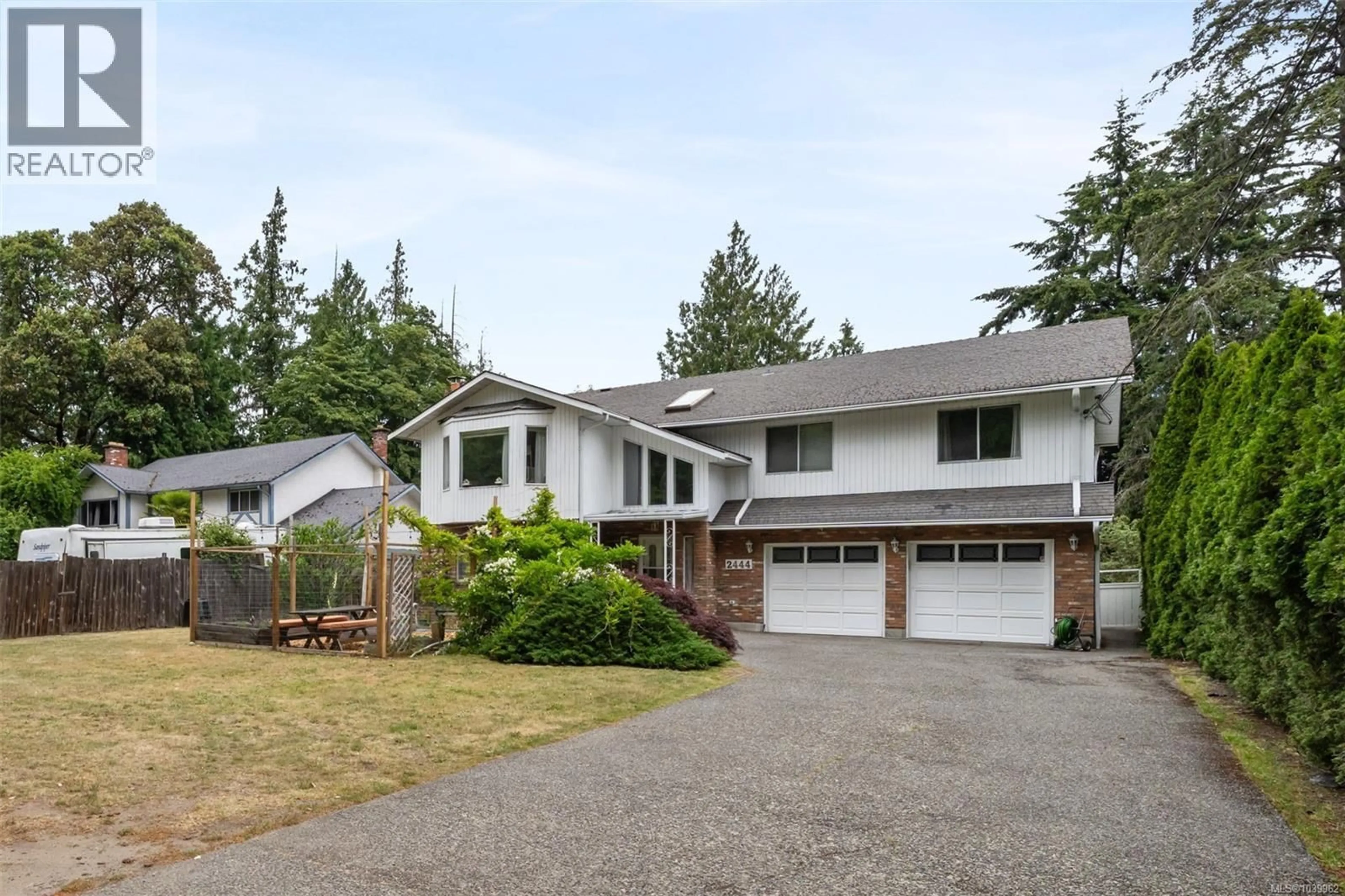 Home with vinyl exterior material, street for 2444 SOOKE ROAD, Colwood British Columbia V9B1X7