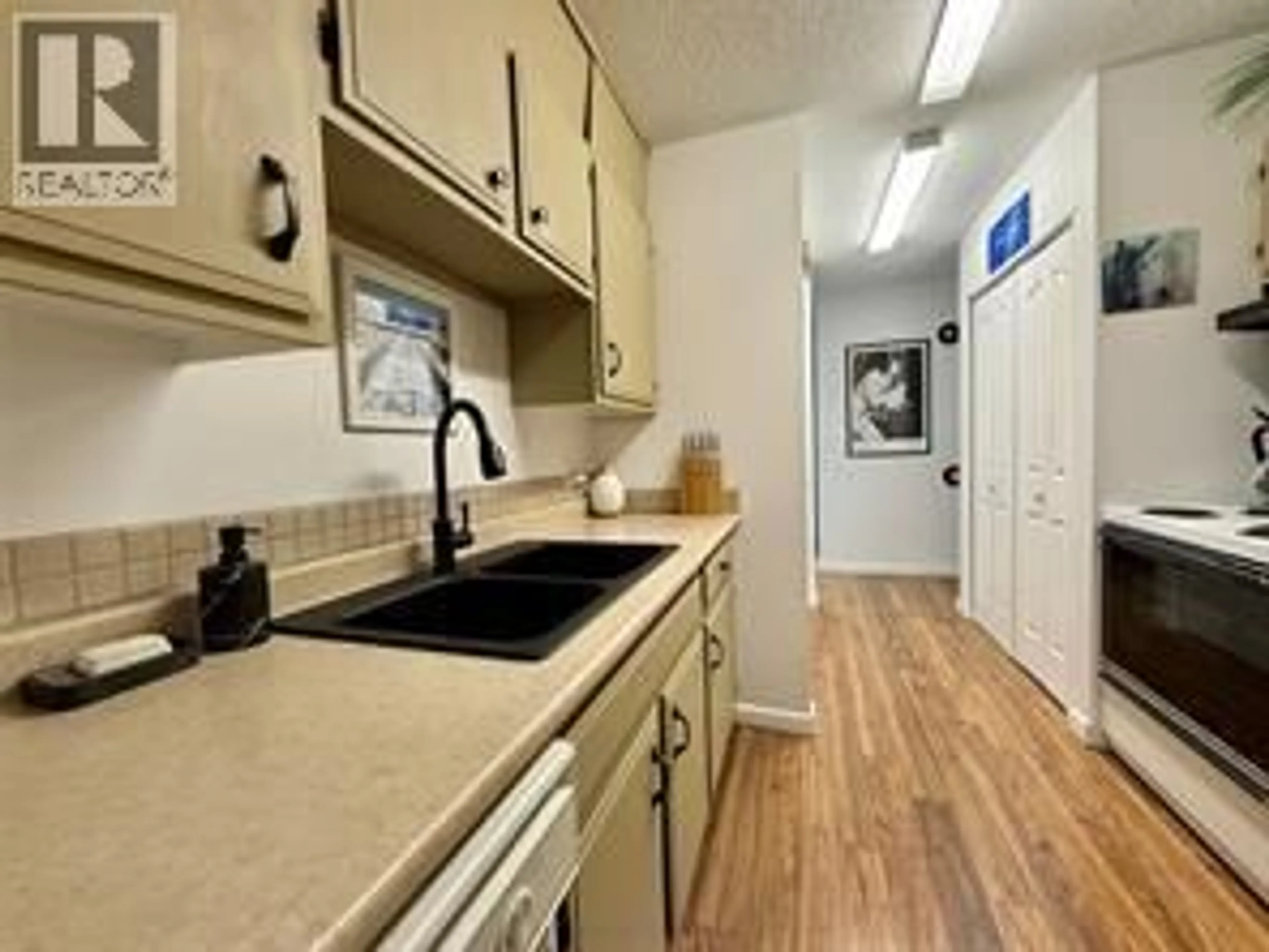 Standard kitchen, ceramic/tile floor for 218 - 1665 UFTON COURT, Kelowna British Columbia V1Y8G7