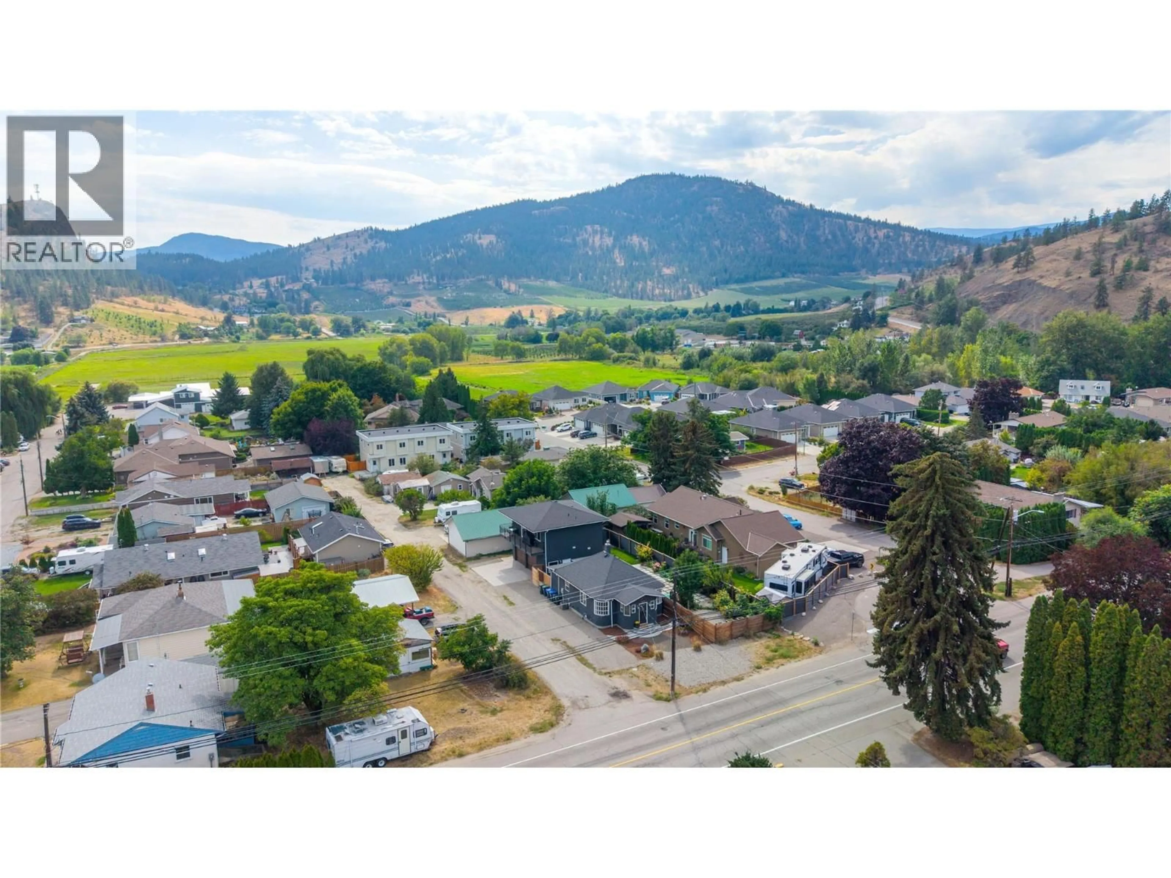 A pic from outside/outdoor area/front of a property/back of a property/a pic from drone, mountain view for 11317 PRAIRIE VALLEY ROAD, Summerland British Columbia V0H1Z8
