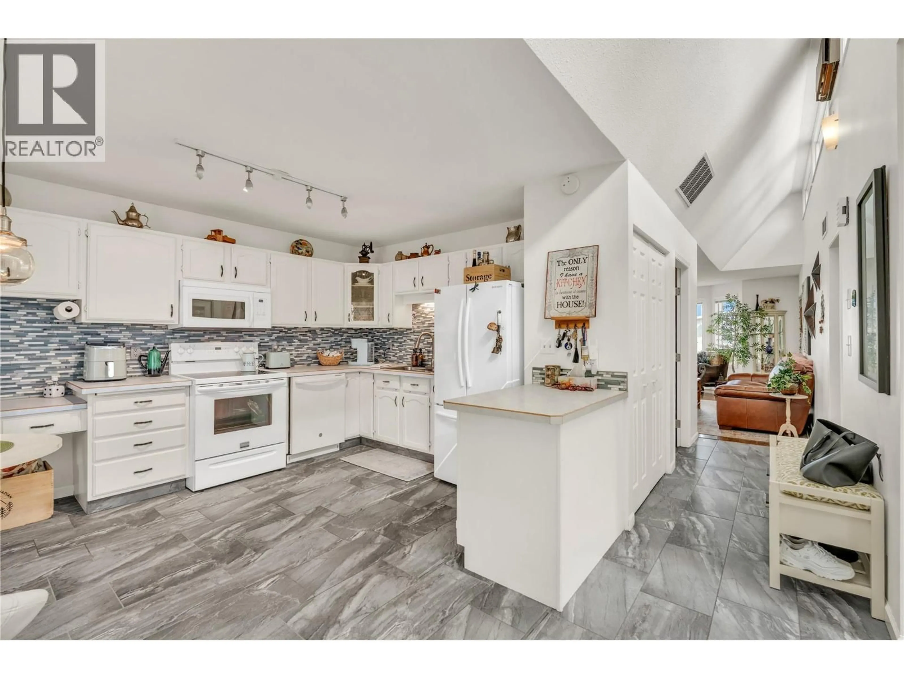 Open concept kitchen, ceramic/tile floor for 1 - 11222 QUINPOOL ROAD, Summerland British Columbia V0H1Z5