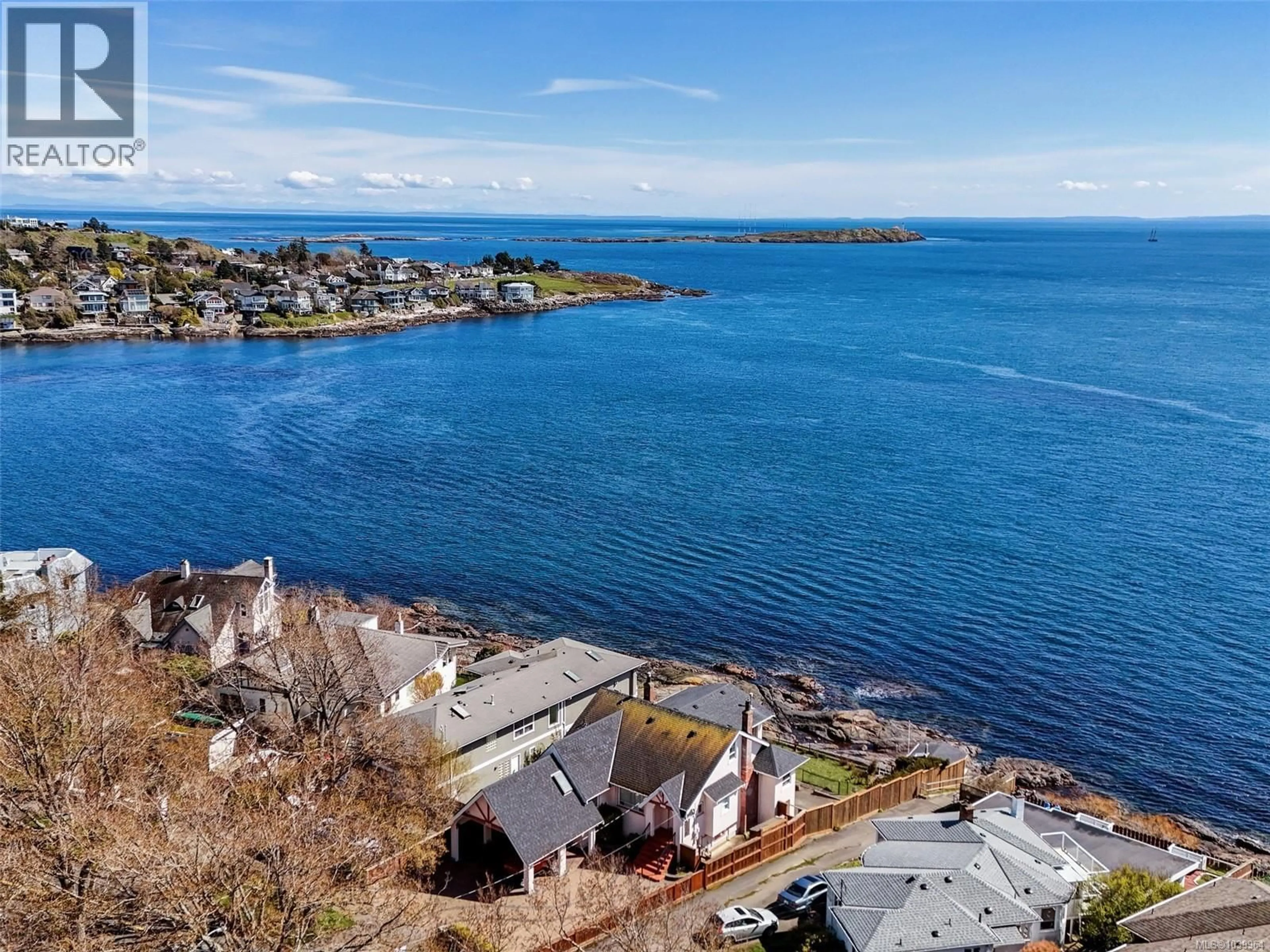 A pic from outside/outdoor area/front of a property/back of a property/a pic from drone, water/lake/river/ocean view for 1811 HOLLYWOOD CRESCENT, Victoria British Columbia V8S1J2