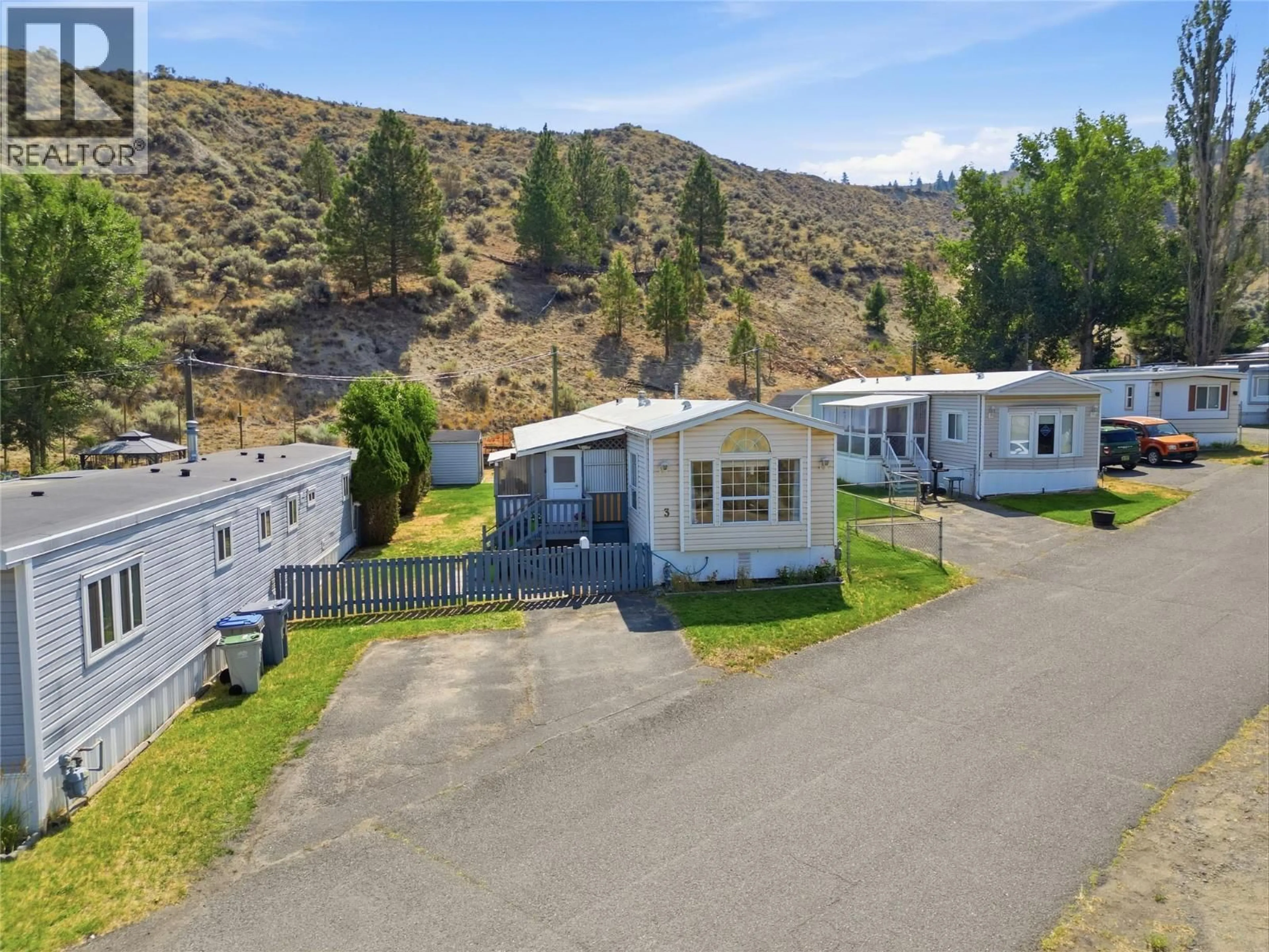 A pic from outside/outdoor area/front of a property/back of a property/a pic from drone, mountain view for 3 - 1175 ROSE HILL ROAD, Kamloops British Columbia V2E1G9