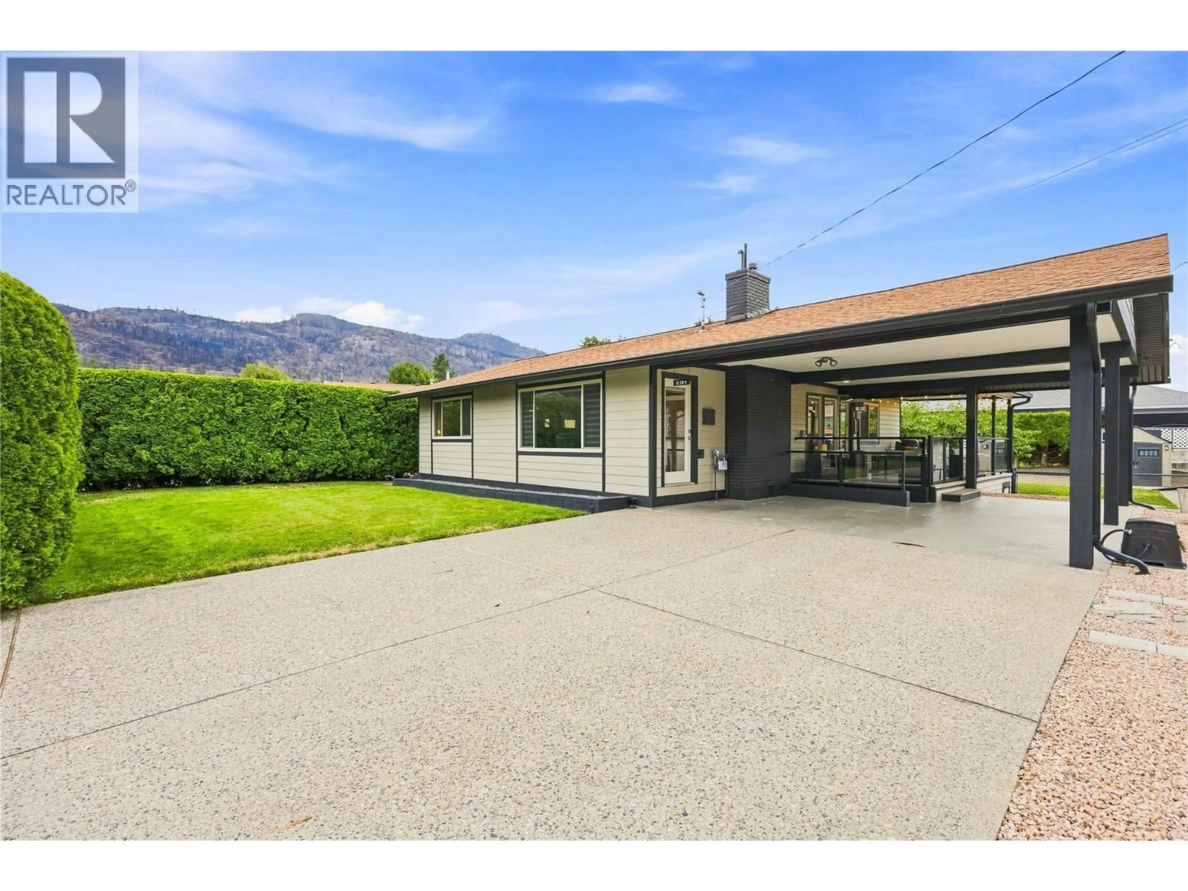 A pic from outside/outdoor area/front of a property/back of a property/a pic from drone, mountain view for 11304 DUNSDON CRESCENT, Summerland British Columbia V0H1Z0