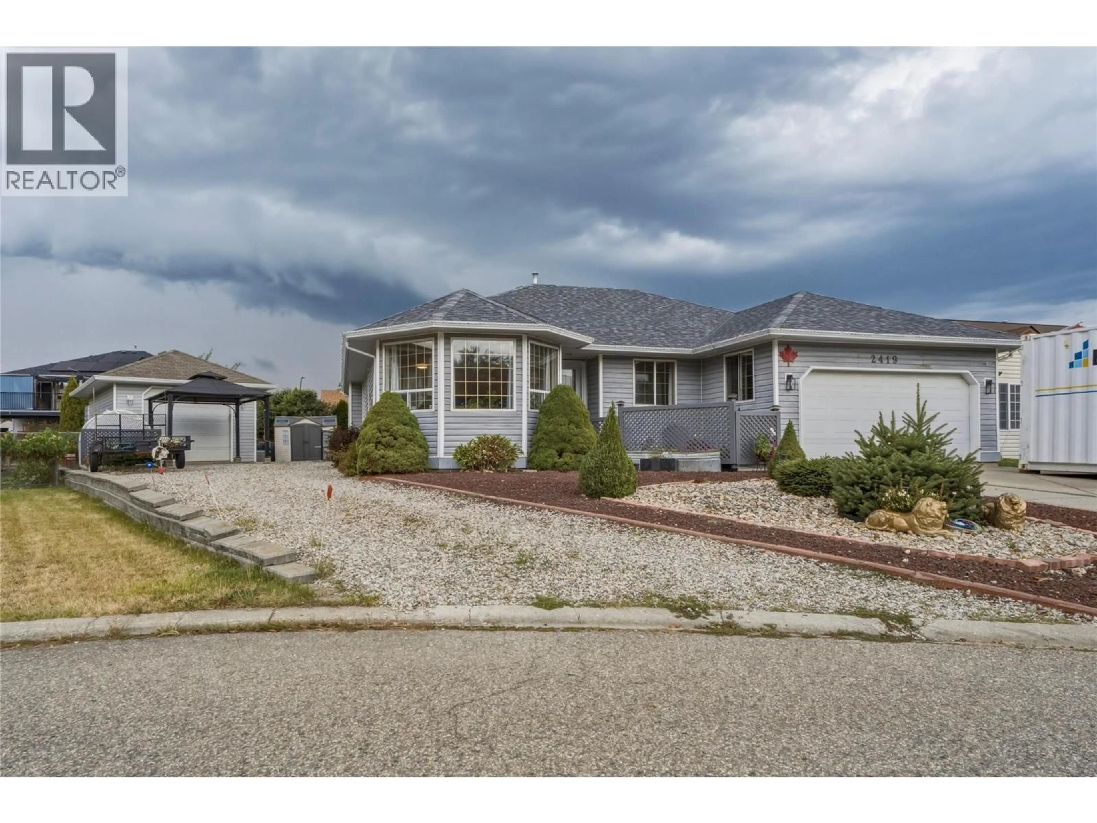 Home with vinyl exterior material, street for 2419 BRADLEY DRIVE, Armstrong British Columbia V0E1B1