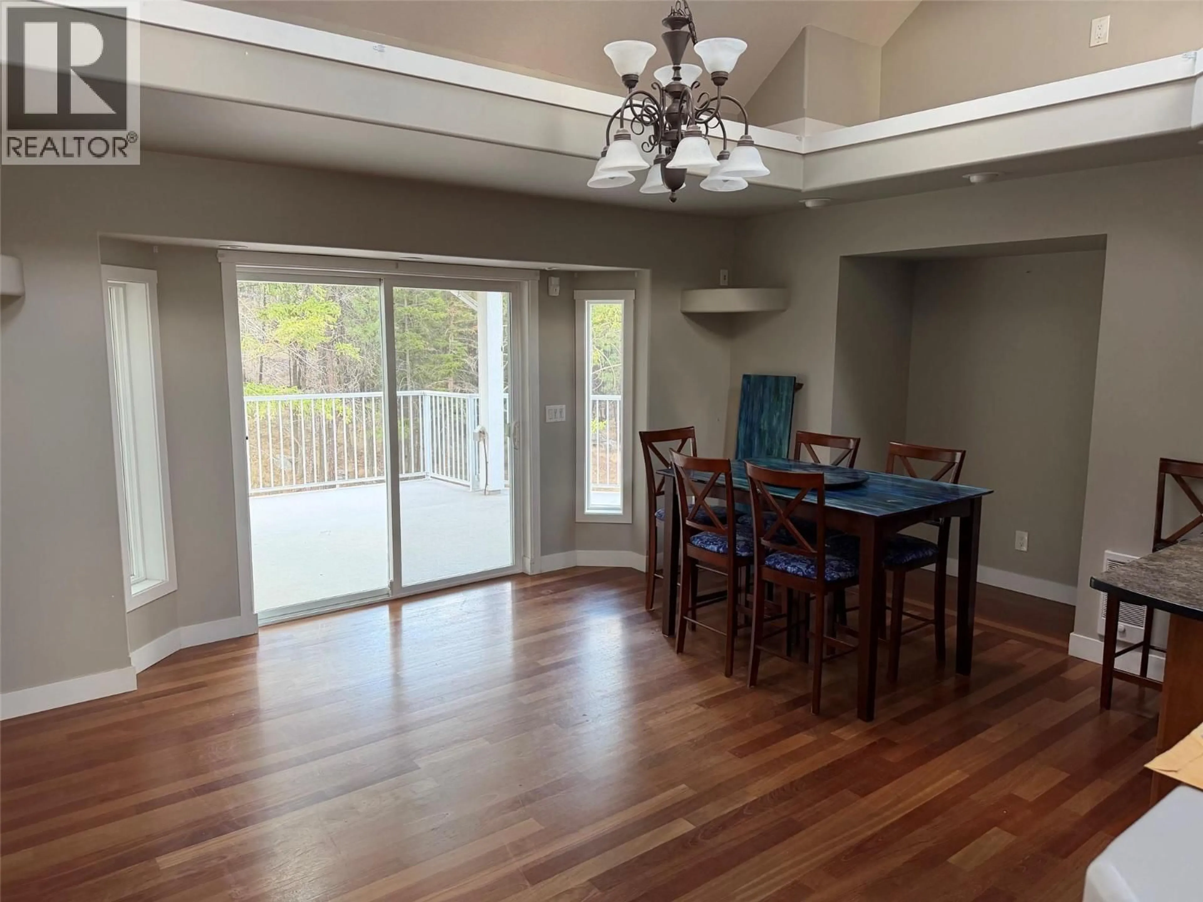 Dining room, wood/laminate floor for 674 MUIR ROAD, Kelowna British Columbia V1Z3W2
