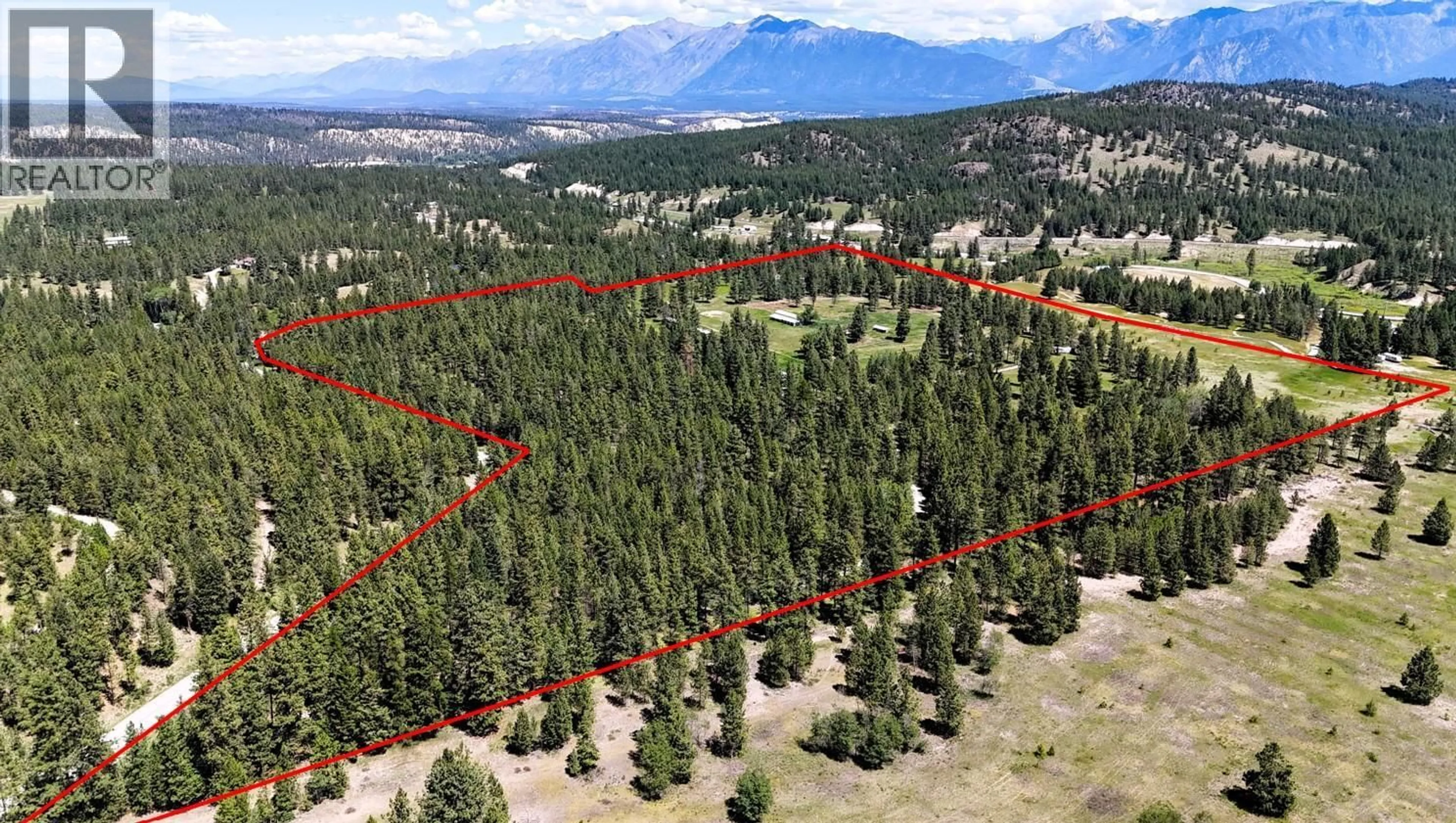 A pic from outside/outdoor area/front of a property/back of a property/a pic from drone, forest/trees view for 4836 KENNEDY ROAD, Cranbrook British Columbia V1C7C1