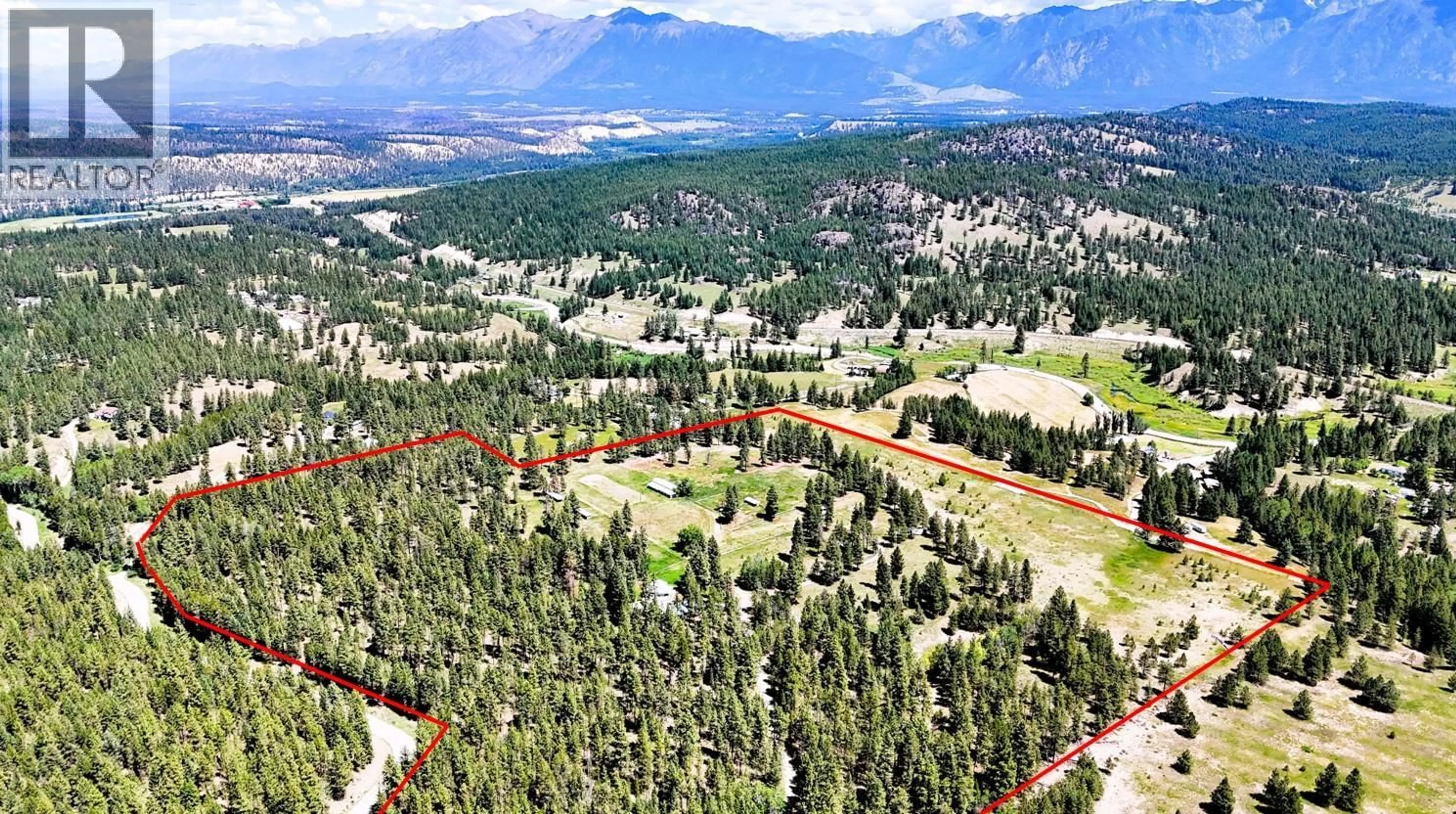 A pic from outside/outdoor area/front of a property/back of a property/a pic from drone, mountain view for 4836 KENNEDY ROAD, Cranbrook British Columbia V1C7C1