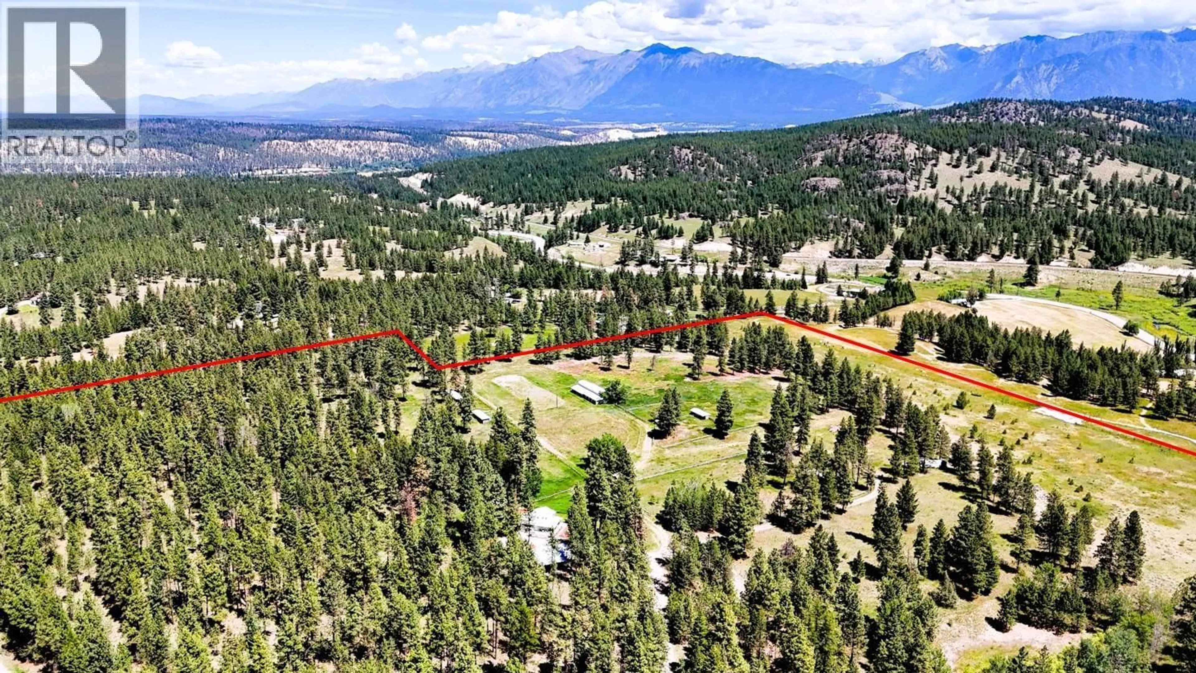 A pic from outside/outdoor area/front of a property/back of a property/a pic from drone, forest/trees view for 4836 KENNEDY ROAD, Cranbrook British Columbia V1C7C1
