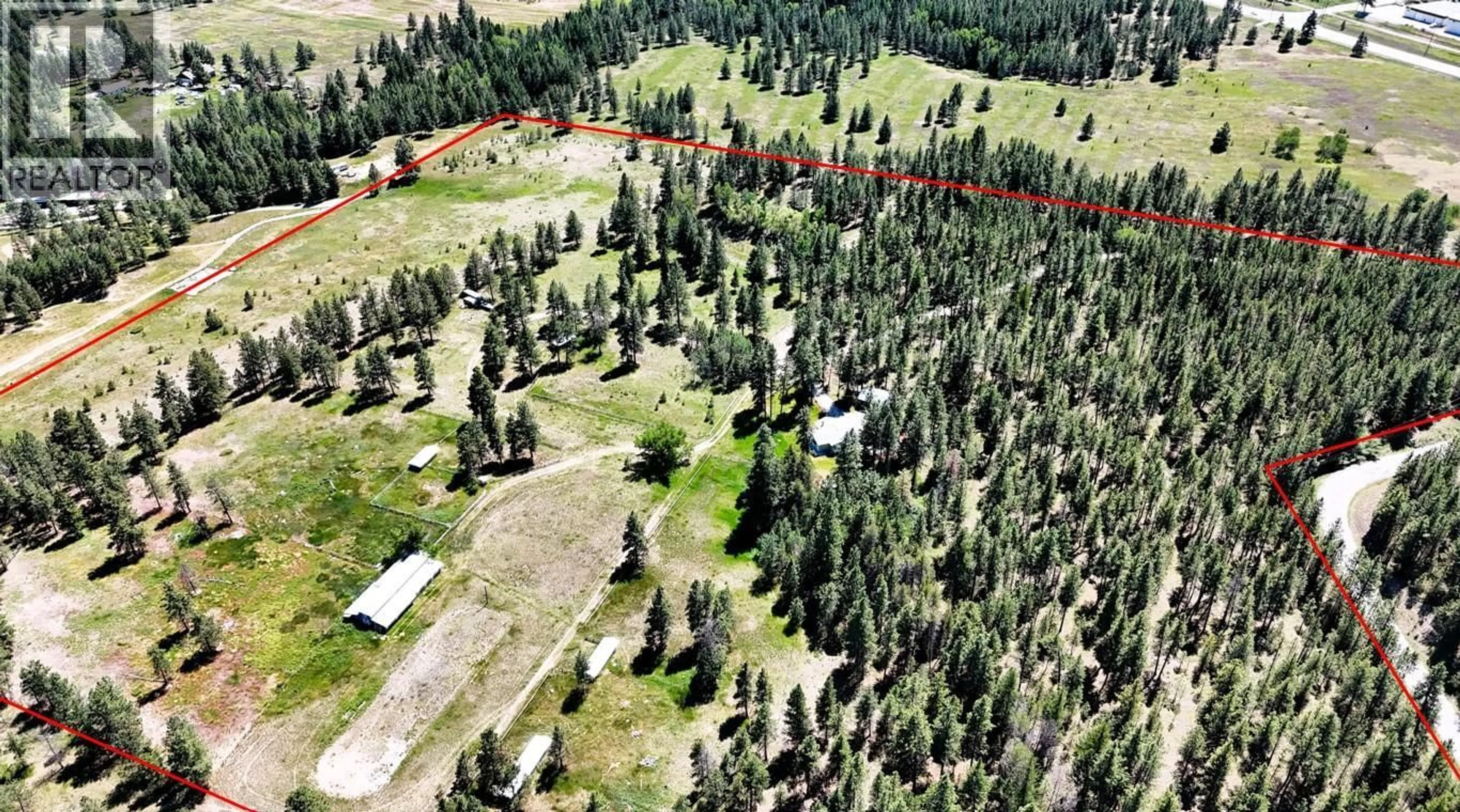 A pic from outside/outdoor area/front of a property/back of a property/a pic from drone, forest/trees view for 4836 KENNEDY ROAD, Cranbrook British Columbia V1C7C1