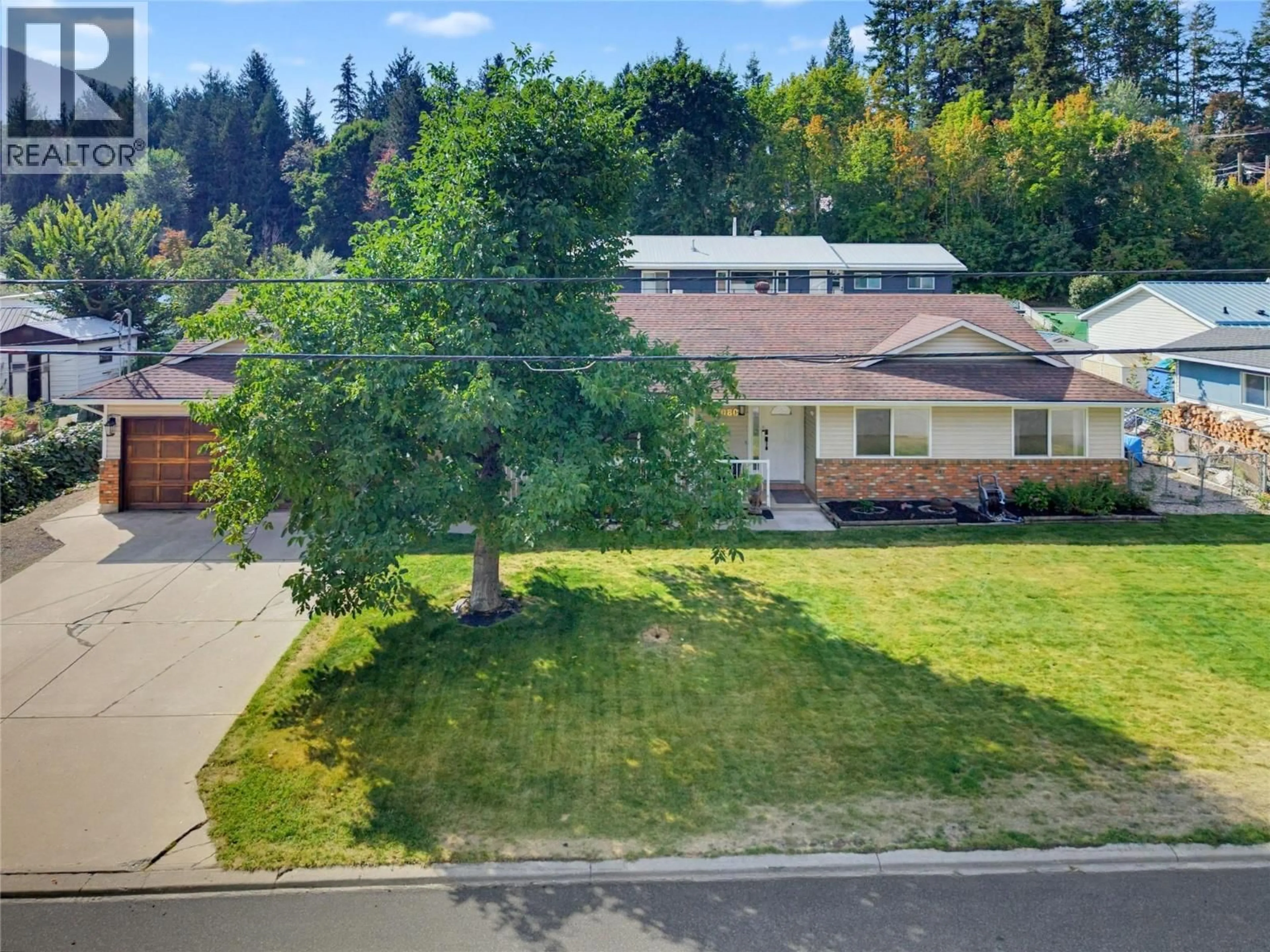 A pic from outside/outdoor area/front of a property/back of a property/a pic from drone, street for 5080 70 AVENUE NORTHEAST, Salmon Arm British Columbia V0E1K0