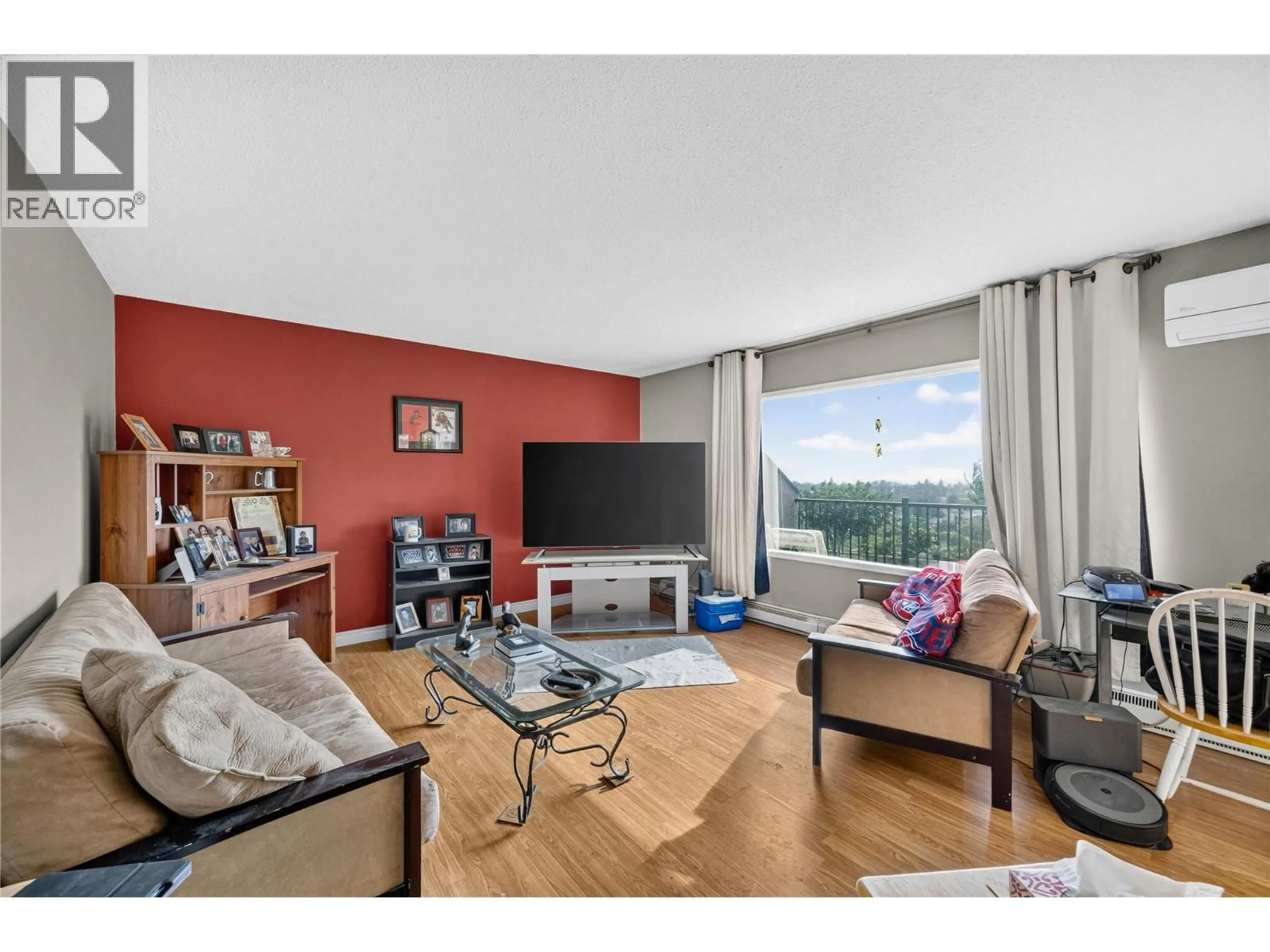 Living room with furniture, wood/laminate floor for 355 & 357 GWYER STREET, Penticton British Columbia V2A1R2