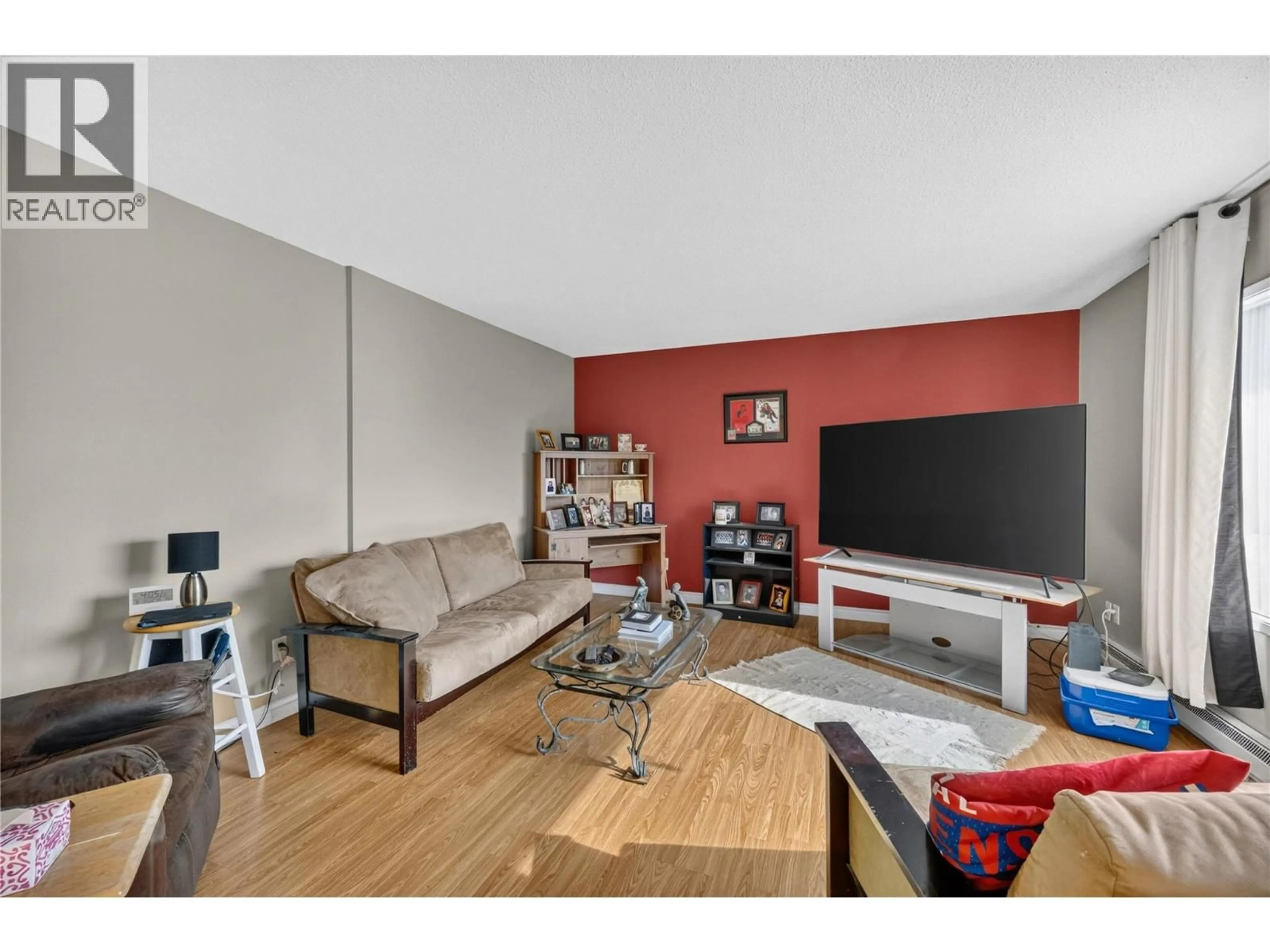 Living room with furniture, wood/laminate floor for 355 & 357 GWYER STREET, Penticton British Columbia V2A1R2