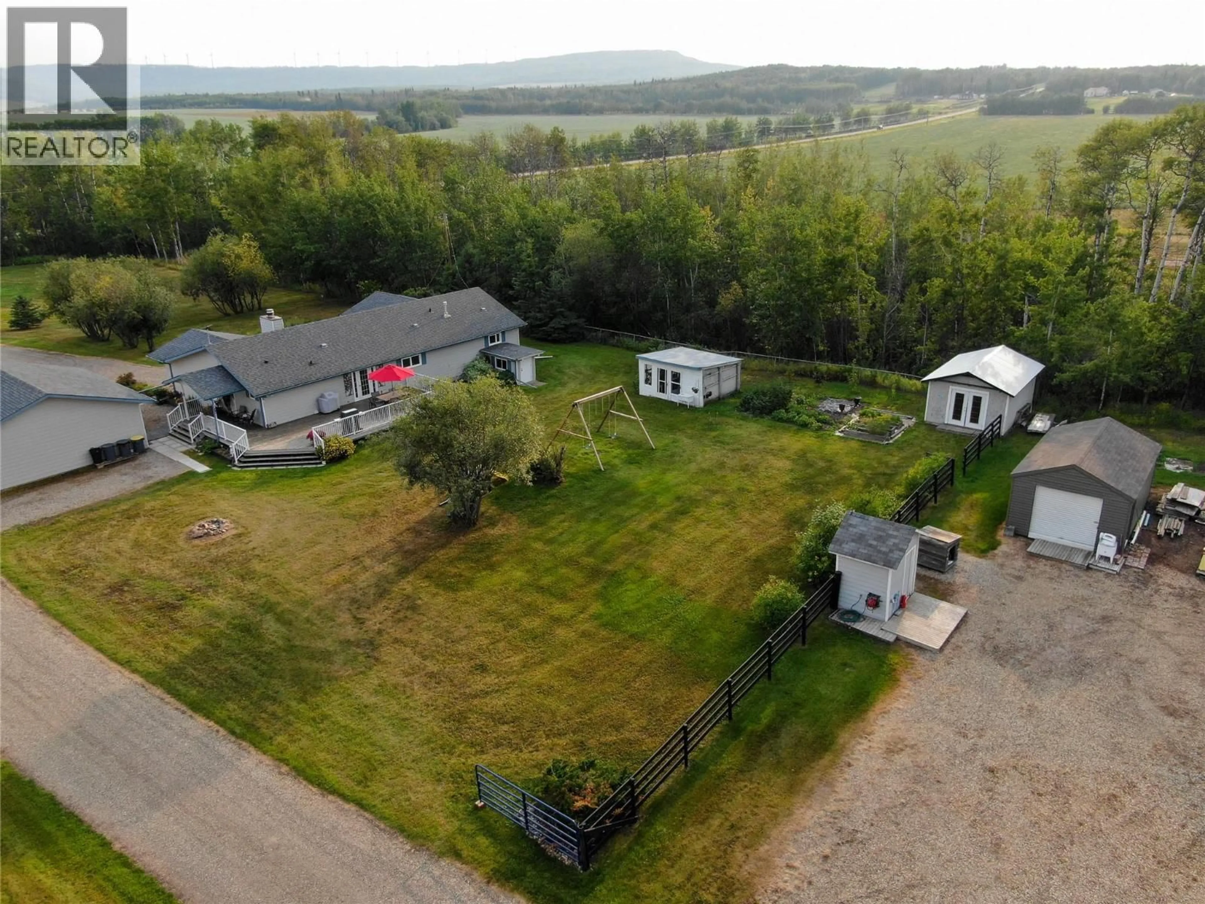 A pic from outside/outdoor area/front of a property/back of a property/a pic from drone, unknown for 3622 208 ROAD, Dawson Creek British Columbia V0C1B0