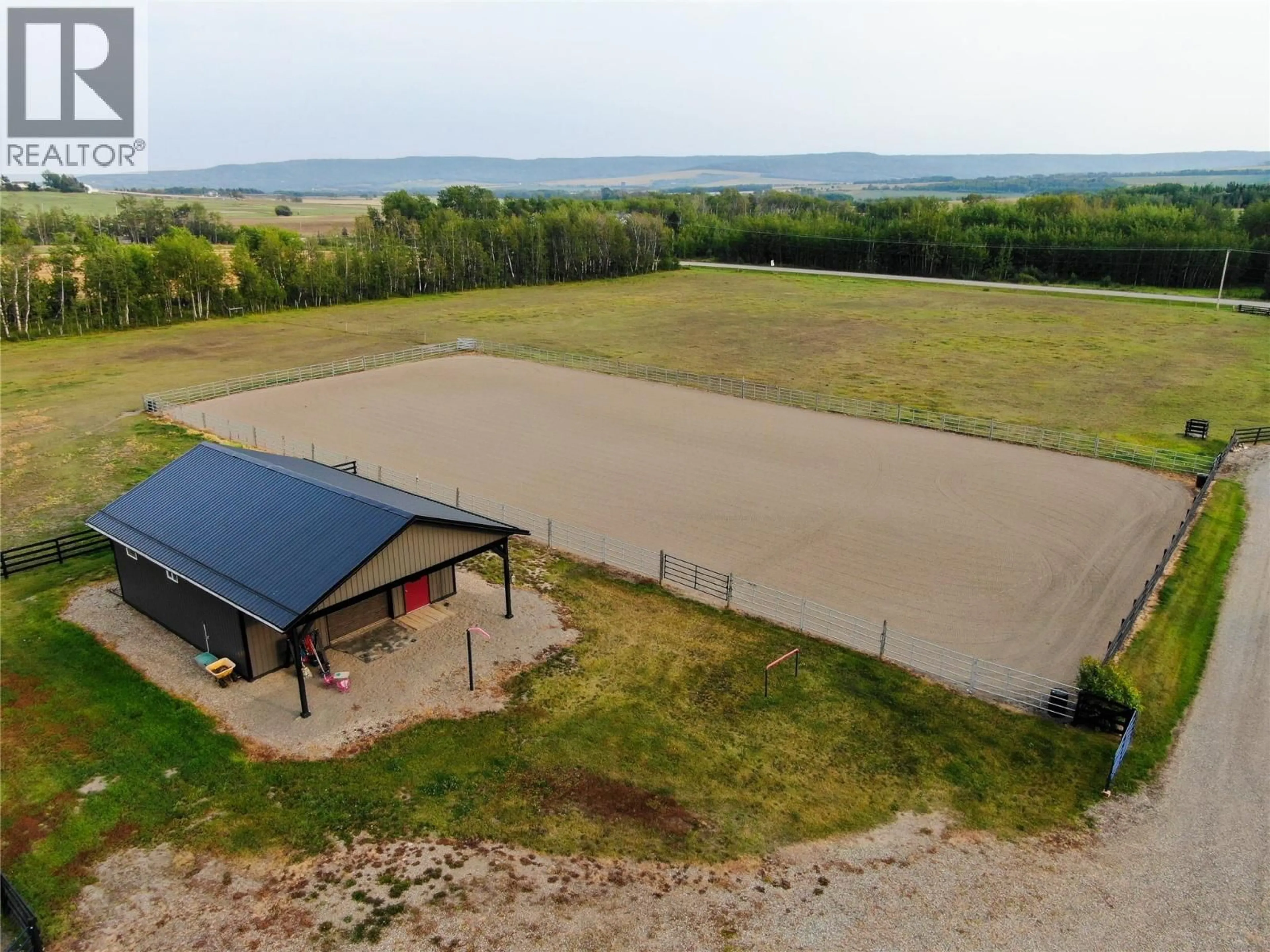 A pic from outside/outdoor area/front of a property/back of a property/a pic from drone, water/lake/river/ocean view for 3622 208 ROAD, Dawson Creek British Columbia V0C1B0