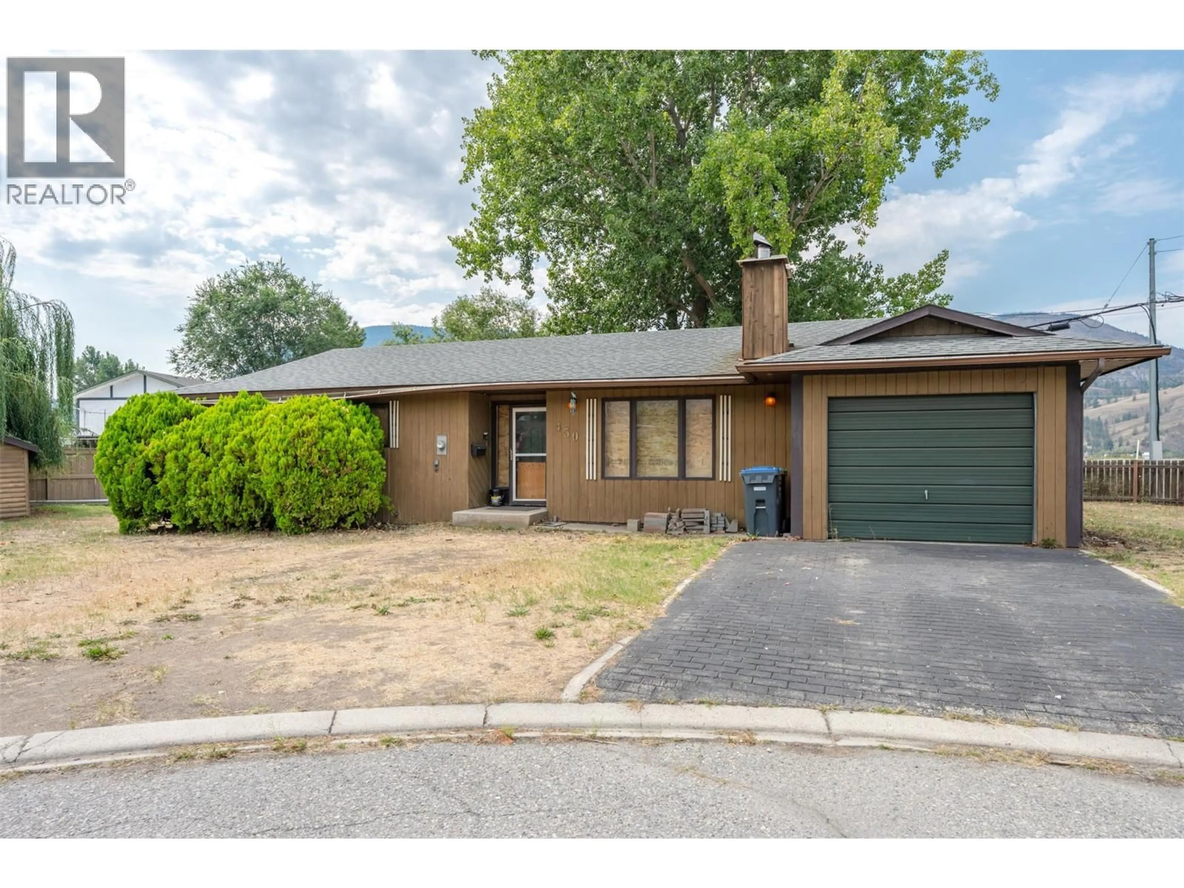 Home with brick exterior material, street for 450 GREEN AVENUE, Penticton British Columbia V2A3T5