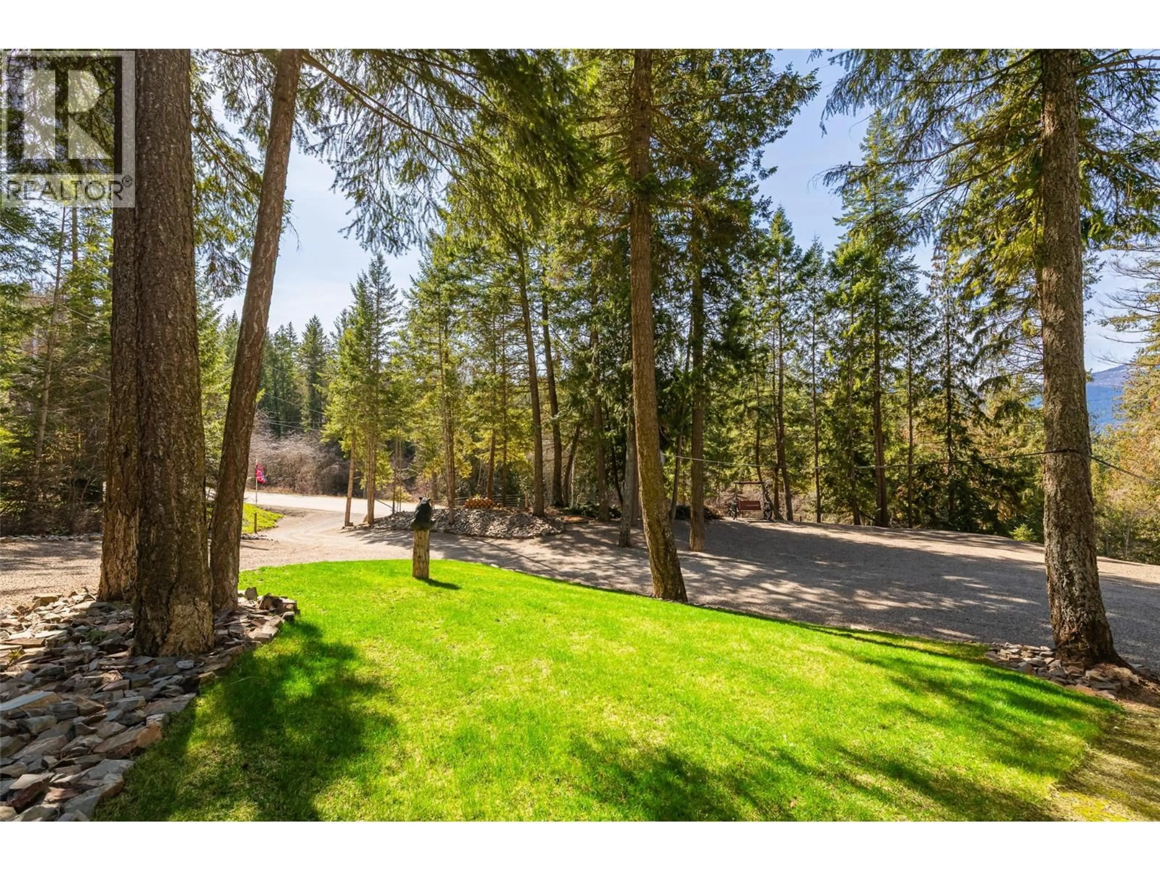 A pic from outside/outdoor area/front of a property/back of a property/a pic from drone, forest/trees view for 1988 PORTHILL ROAD, Creston British Columbia V0B1G2