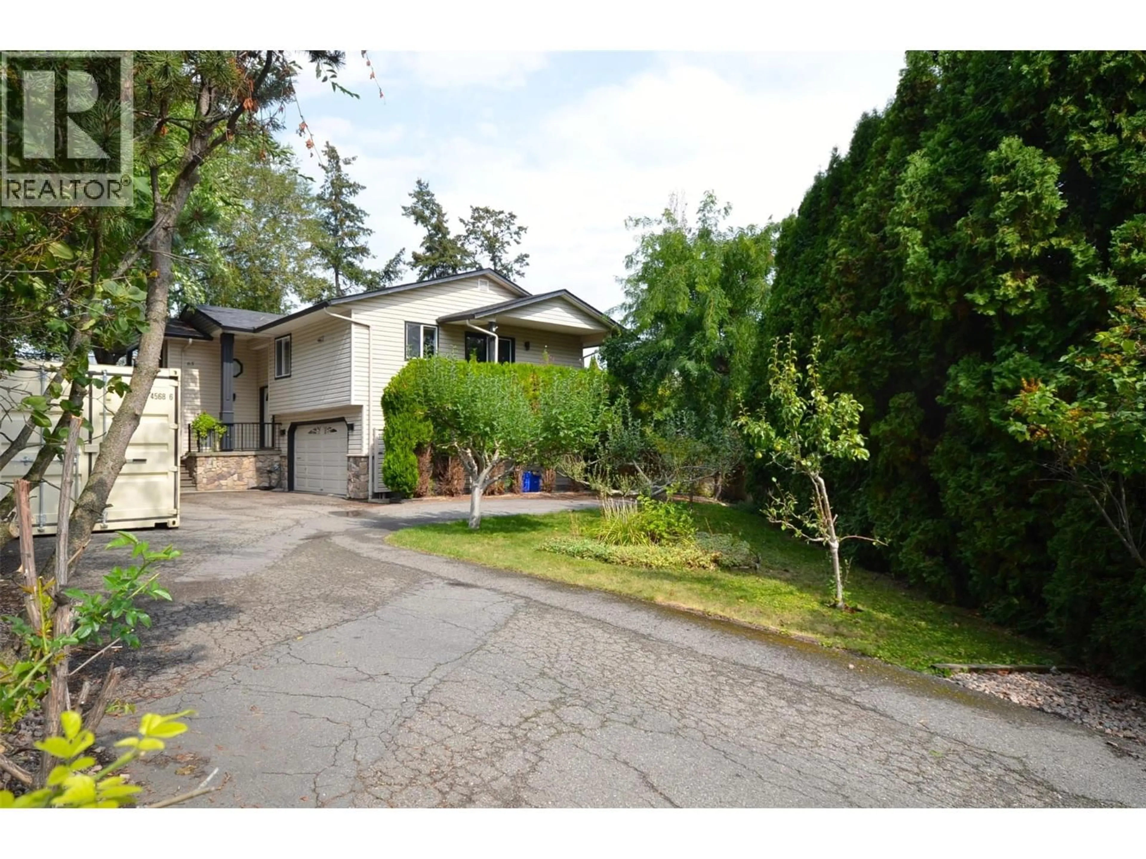 A pic from outside/outdoor area/front of a property/back of a property/a pic from drone, street for 65 SARSONS PLACE, Coldstream British Columbia V1B2K8