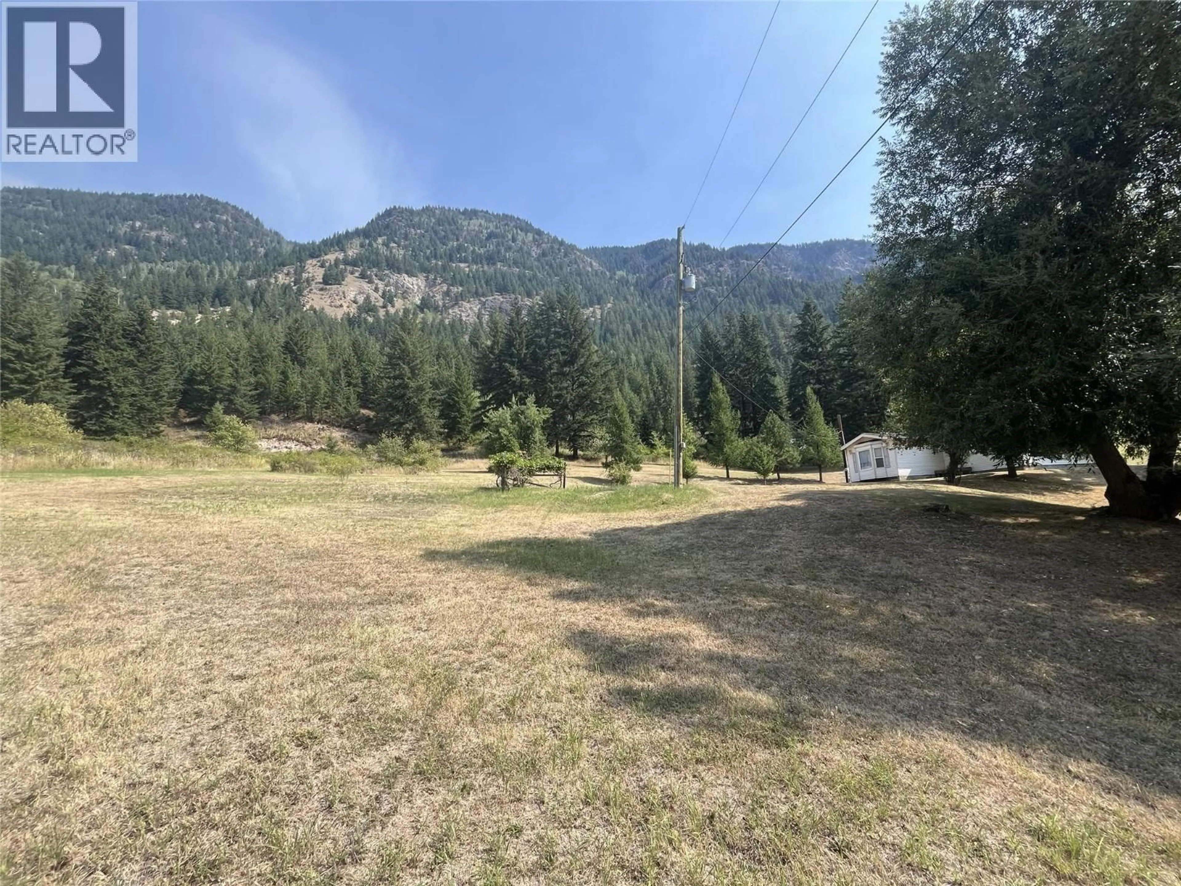A pic from outside/outdoor area/front of a property/back of a property/a pic from drone, mountain view for 372 AGATE BAY ROAD, Barriere British Columbia V0E2E0