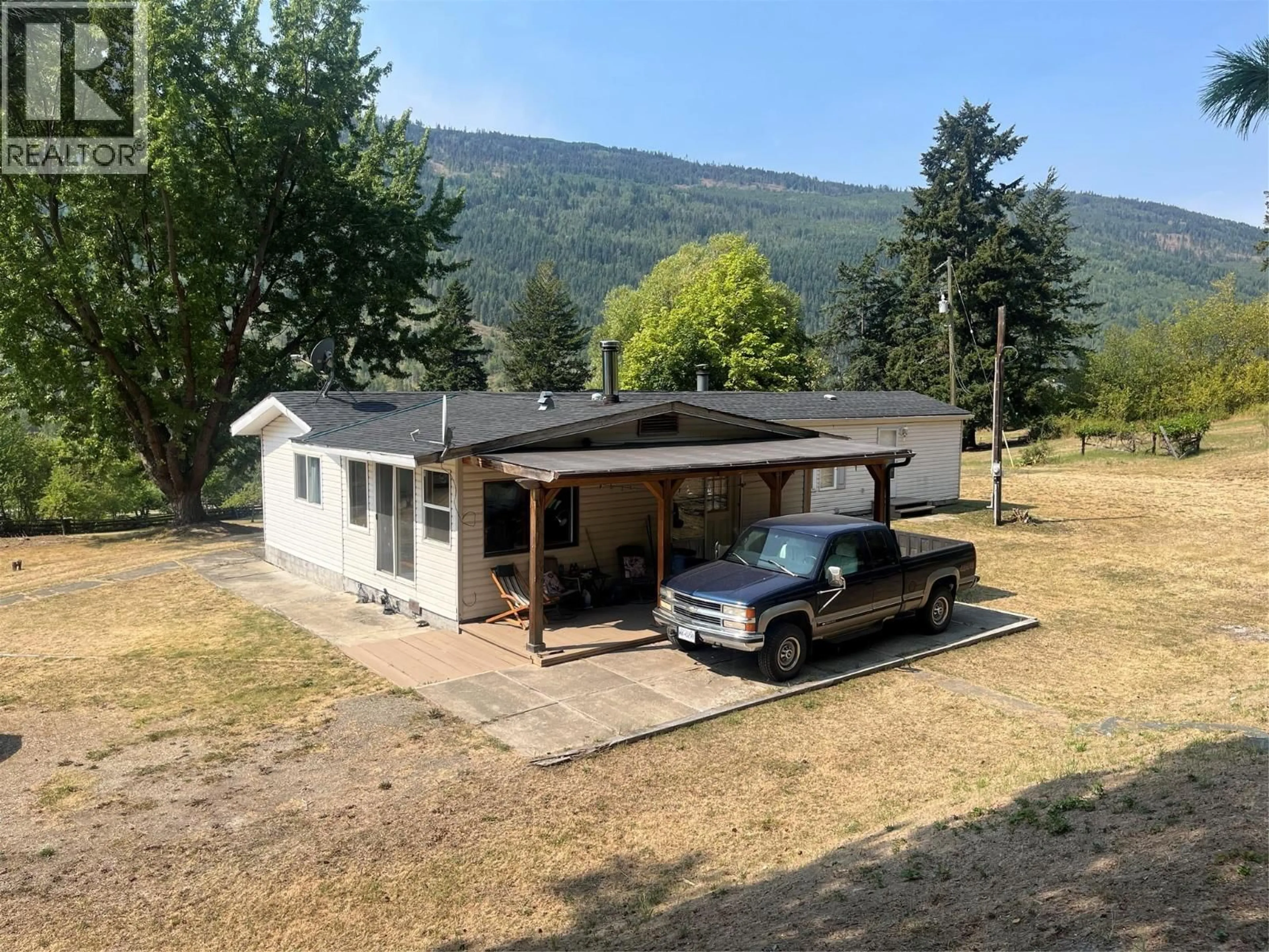 A pic from outside/outdoor area/front of a property/back of a property/a pic from drone, mountain view for 372 AGATE BAY ROAD, Barriere British Columbia V0E2E0