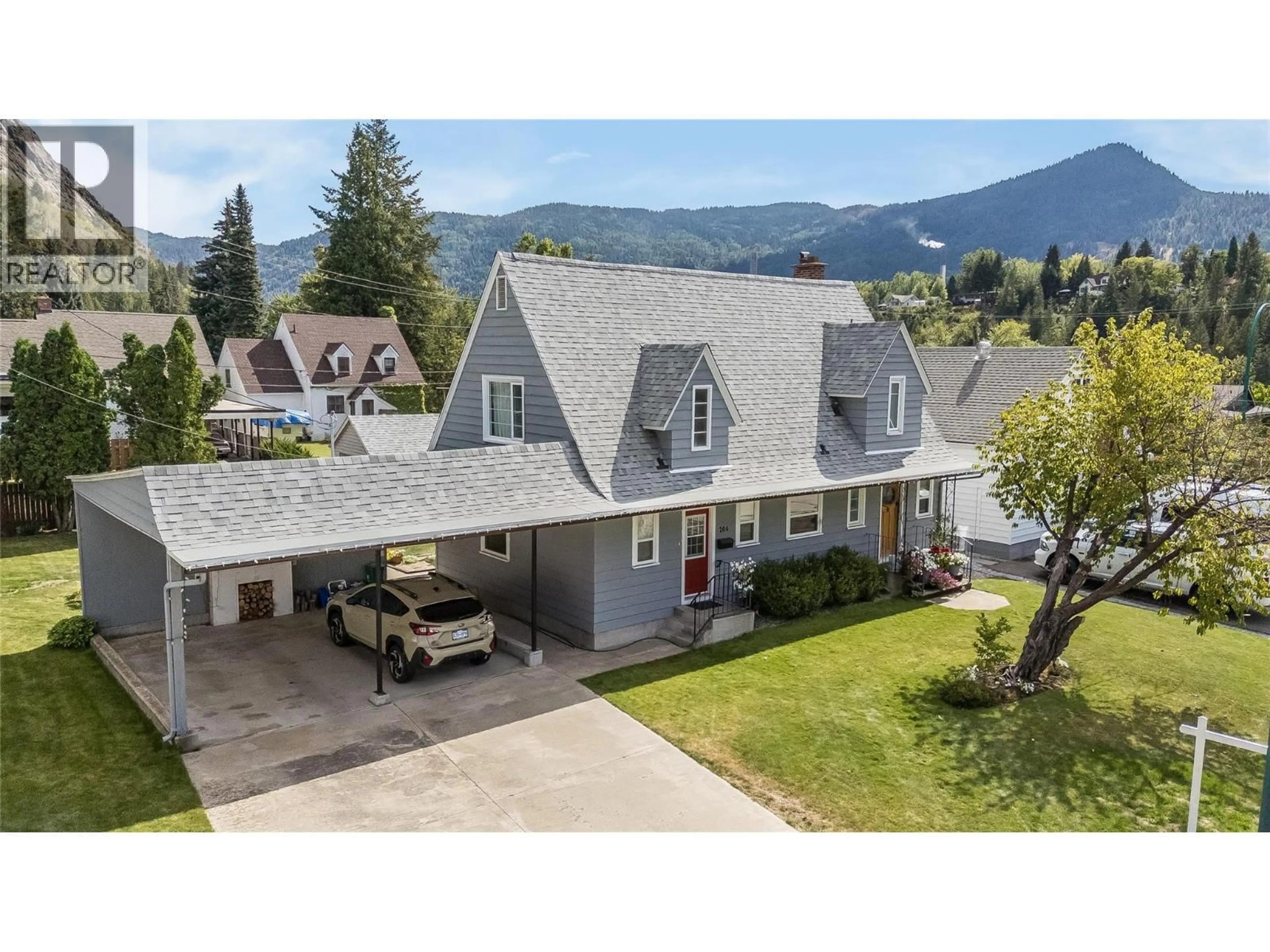 A pic from outside/outdoor area/front of a property/back of a property/a pic from drone, mountain view for 204 DIANA CRESCENT, Trail British Columbia V1R1A3