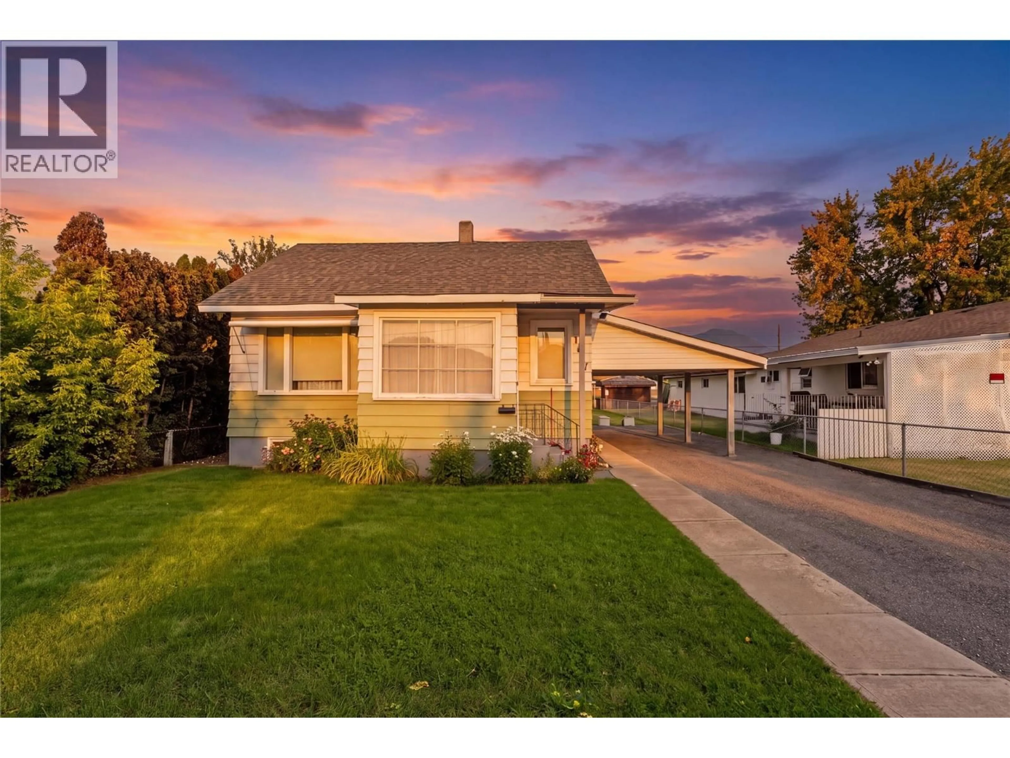 Home with vinyl exterior material, street for 1887 GRANITE AVENUE, Merritt British Columbia V1K1B8