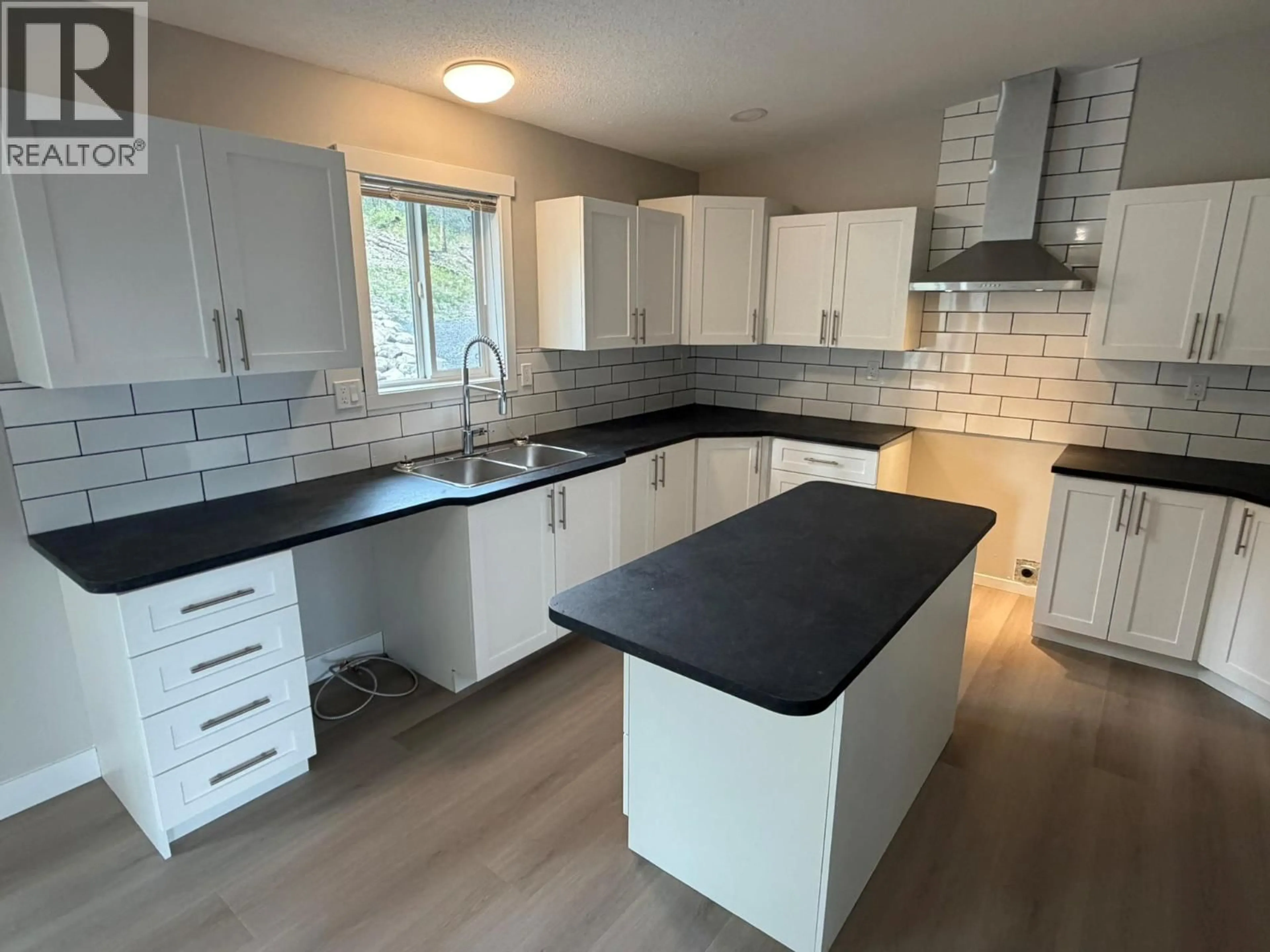 Open concept kitchen, unknown for 7932 ALPINE ROAD, Kelowna British Columbia V1Z3V4