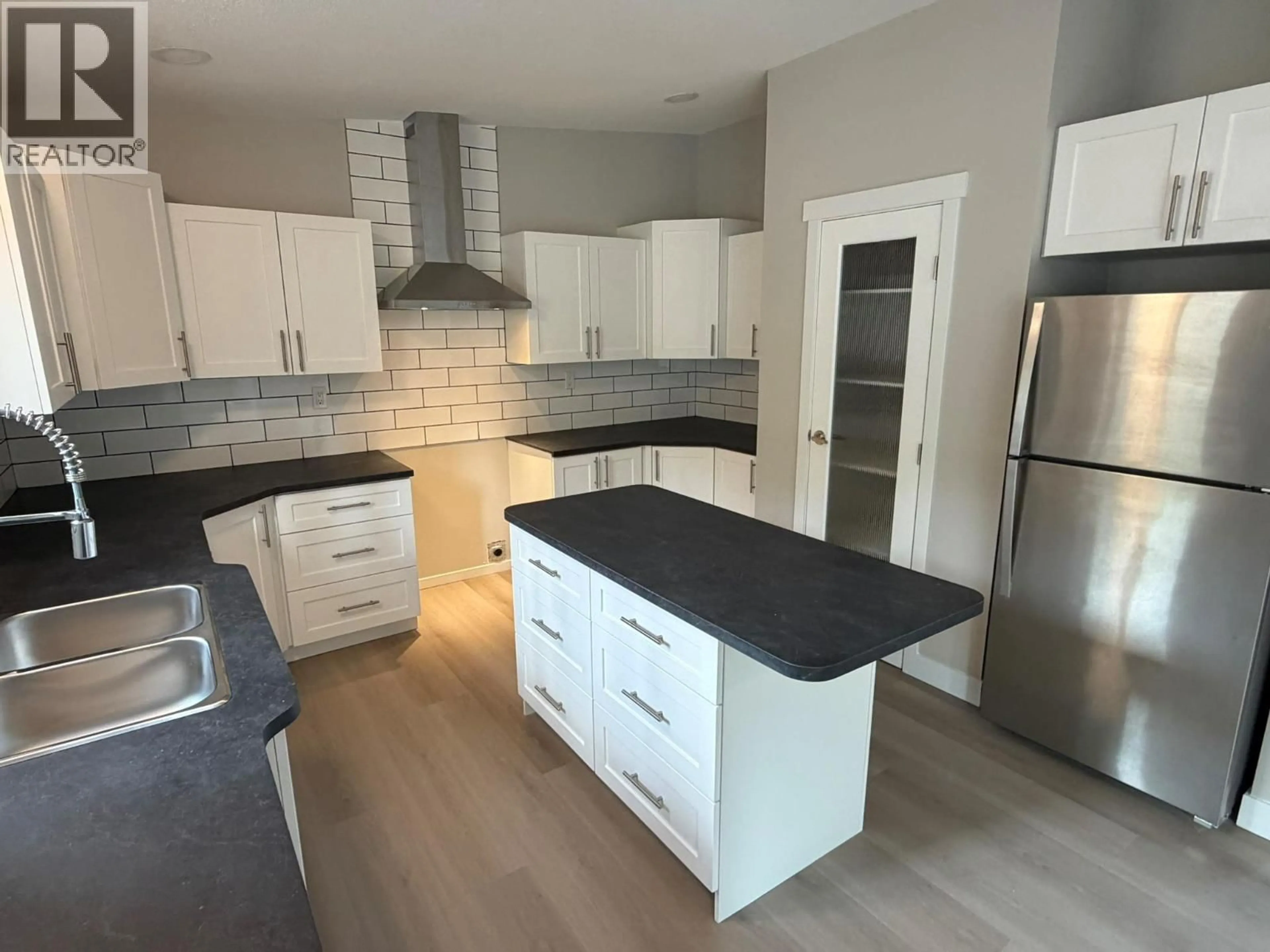 Open concept kitchen, unknown for 7932 ALPINE ROAD, Kelowna British Columbia V1Z3V4