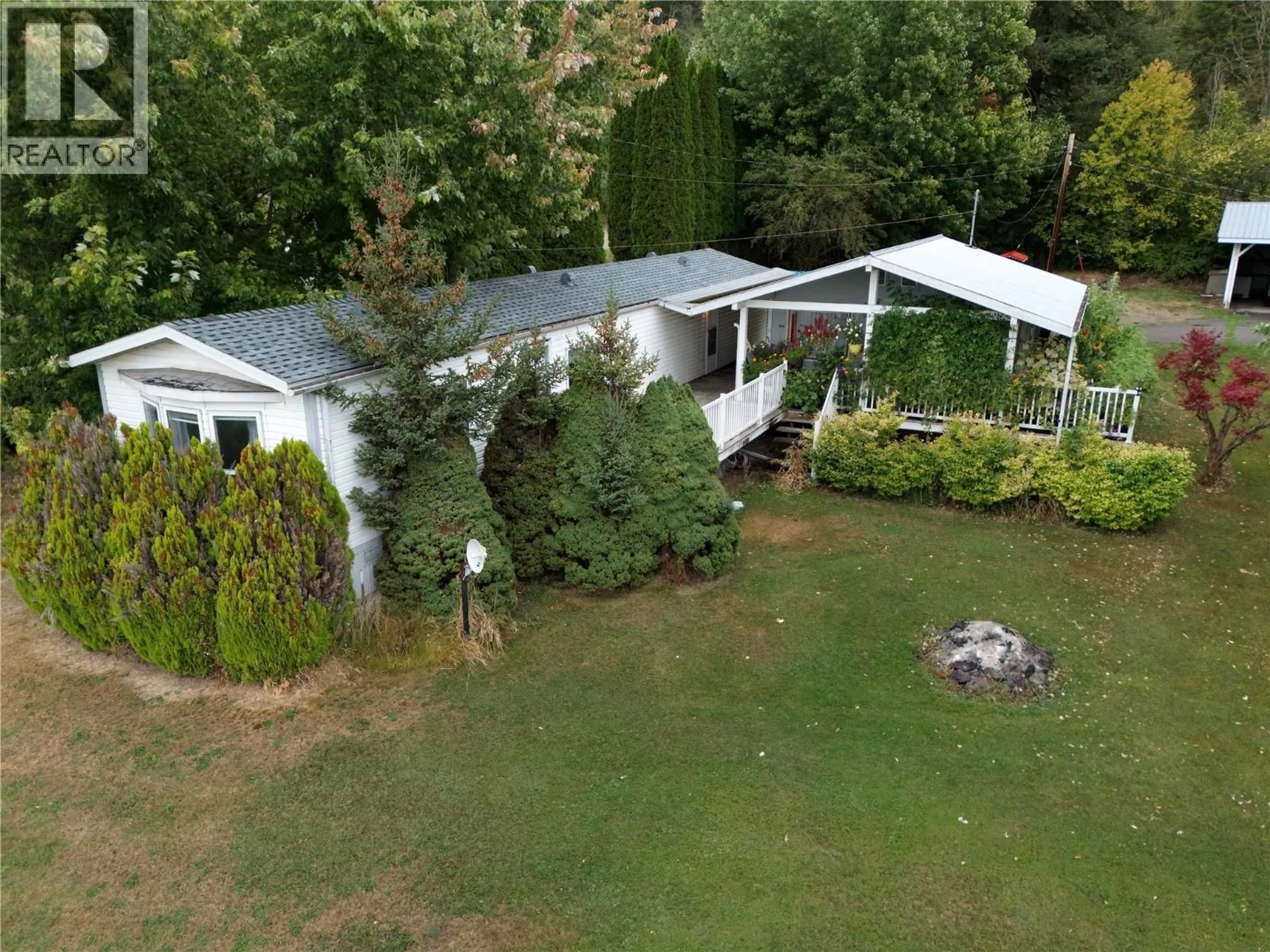 A pic from outside/outdoor area/front of a property/back of a property/a pic from drone, unknown for 1-2780 ROCKY POINT ROAD, Creston British Columbia V0B1G8