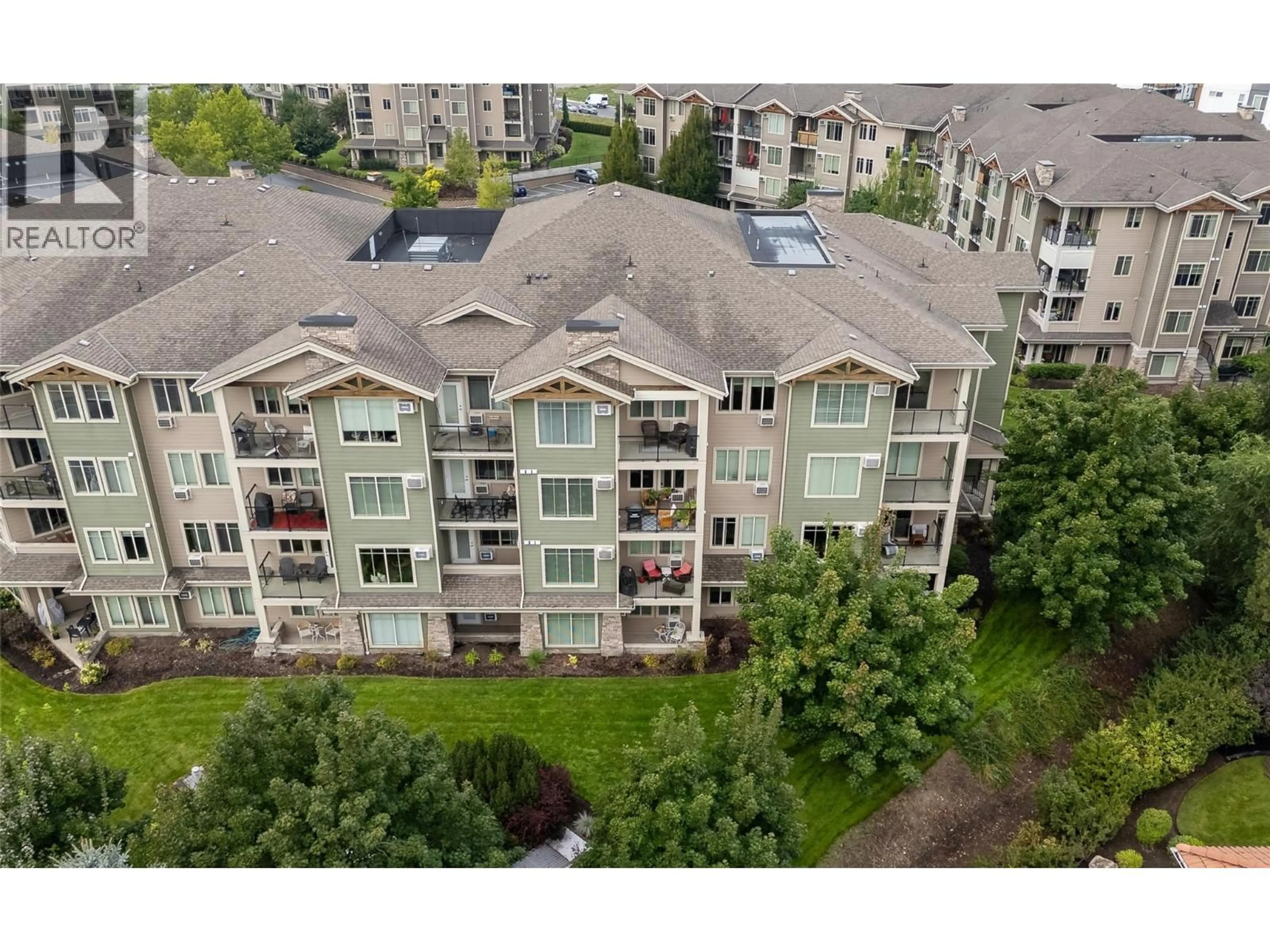 A pic from outside/outdoor area/front of a property/back of a property/a pic from drone, city buildings view from balcony for 110 - 3735 CASORSO ROAD, Kelowna British Columbia V1W5G1