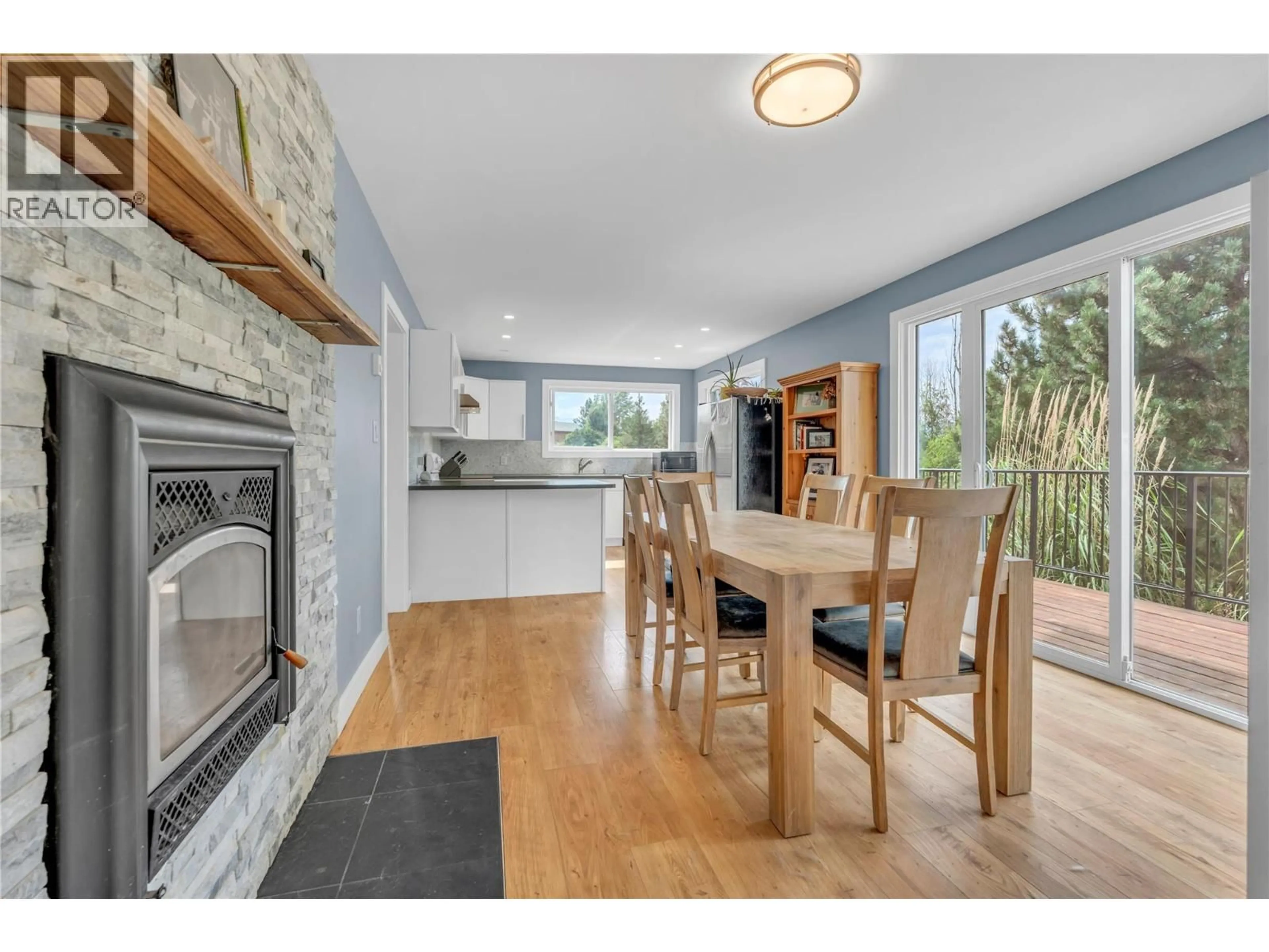 Open concept kitchen, wood/laminate floor for 770 LOWER DEBECK ROAD, Naramata British Columbia V0H1N0
