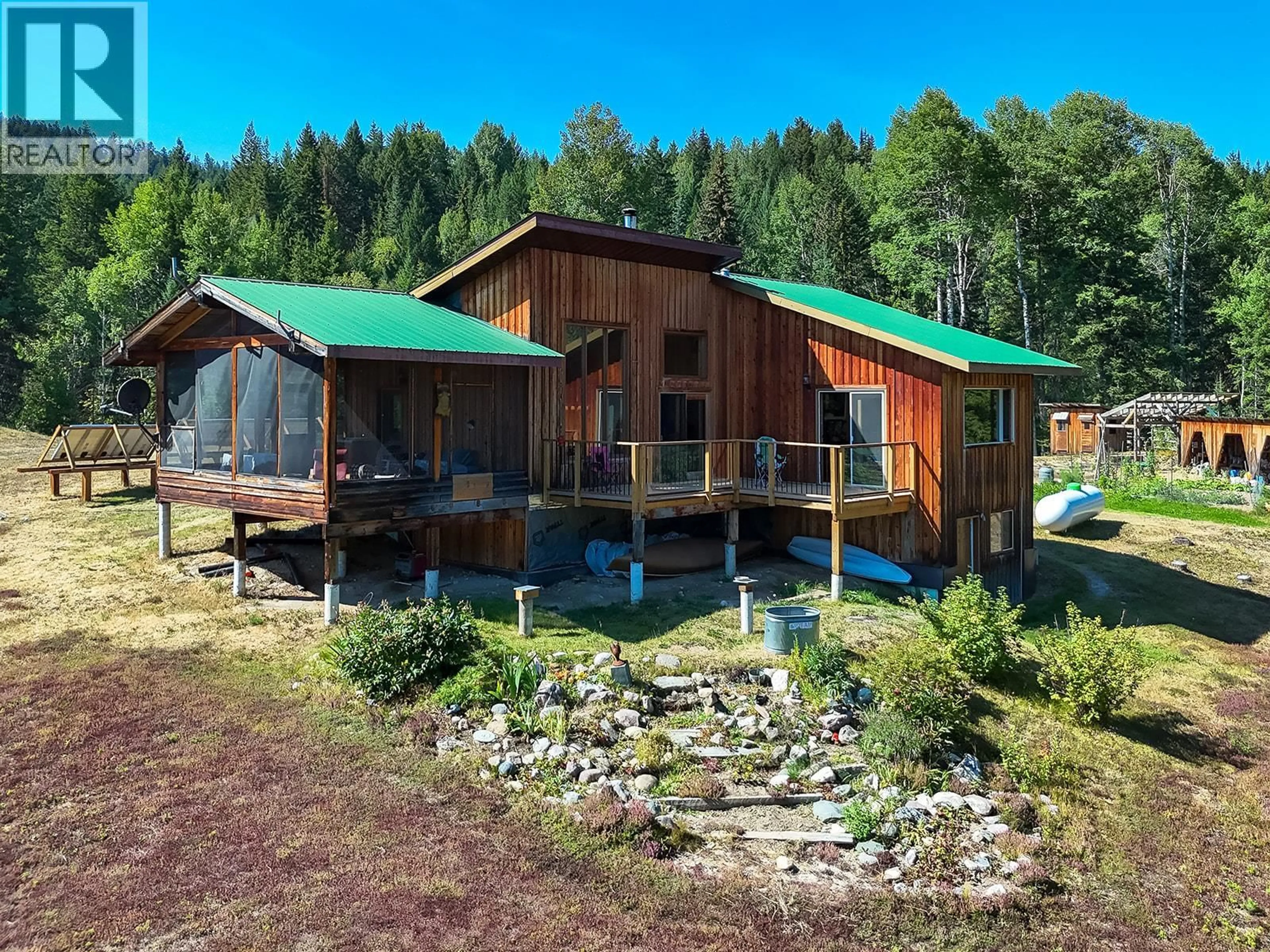A pic from outside/outdoor area/front of a property/back of a property/a pic from drone, forest/trees view for 4151 THOMAS ROAD, Golden British Columbia V0A1L0