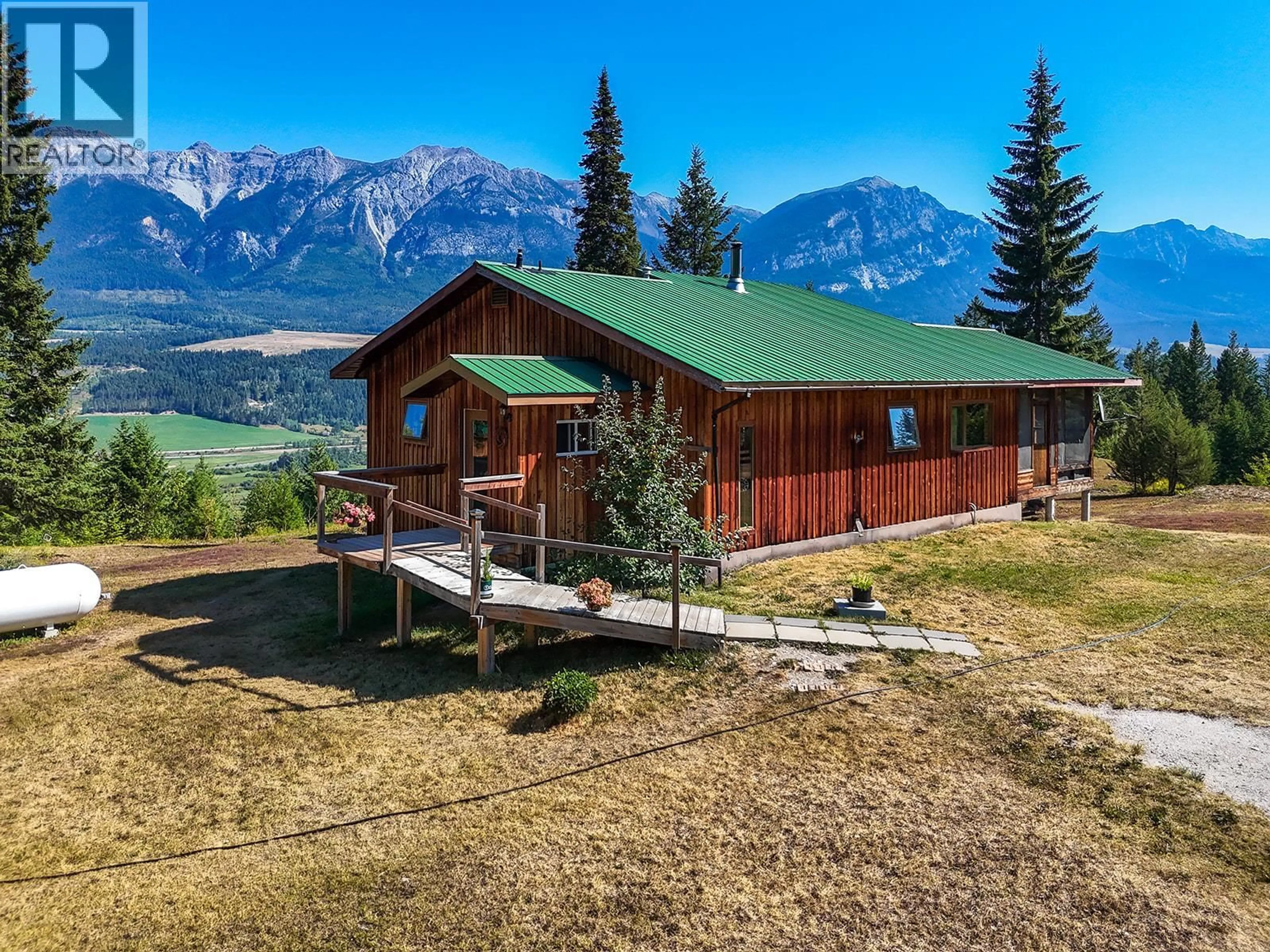 A pic from outside/outdoor area/front of a property/back of a property/a pic from drone, mountain view for 4151 THOMAS ROAD, Golden British Columbia V0A1L0