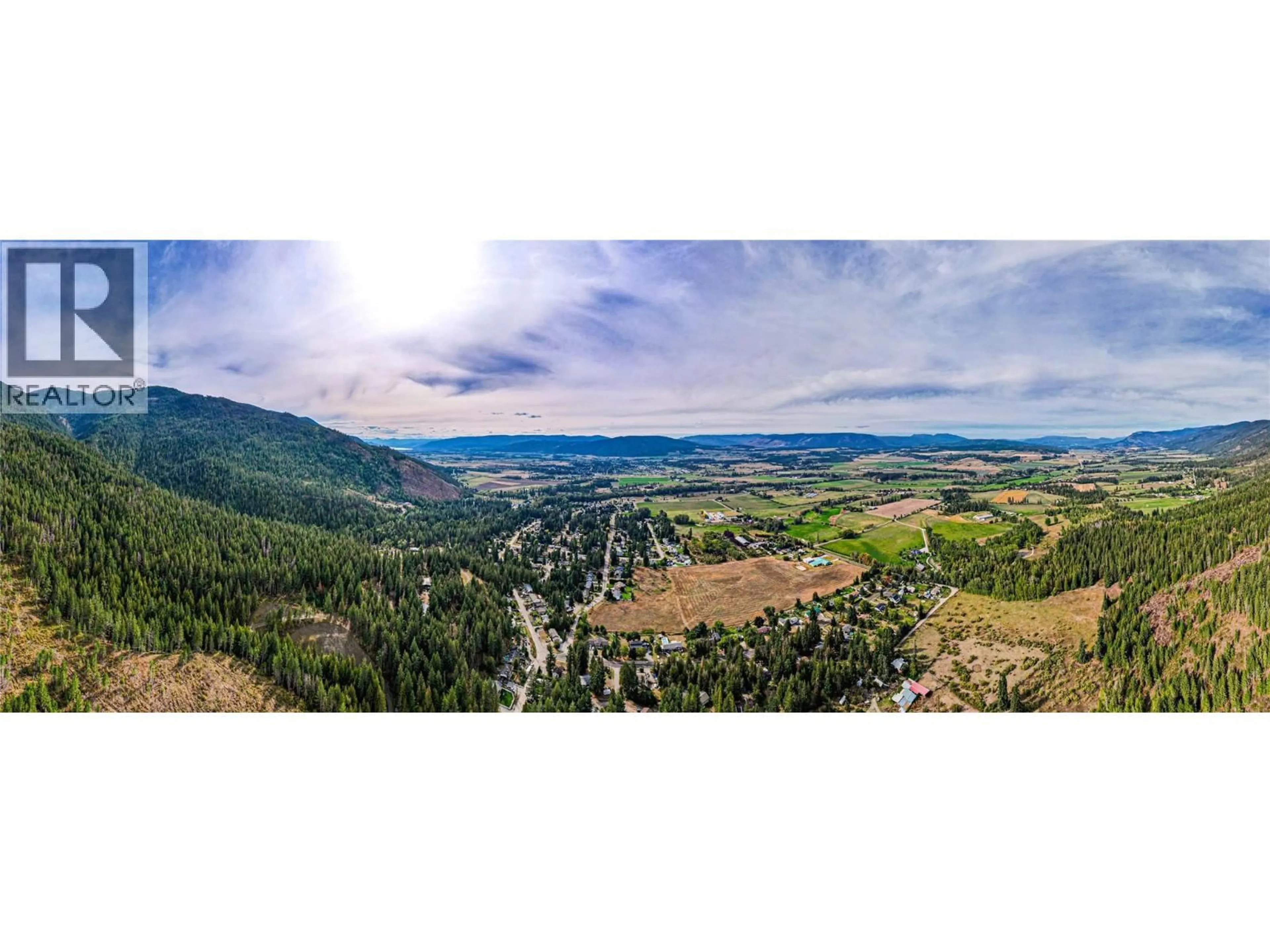 A pic from outside/outdoor area/front of a property/back of a property/a pic from drone, mountain view for 3275 UPPER MCLEOD ROAD, Spallumcheen British Columbia V4Y0S6