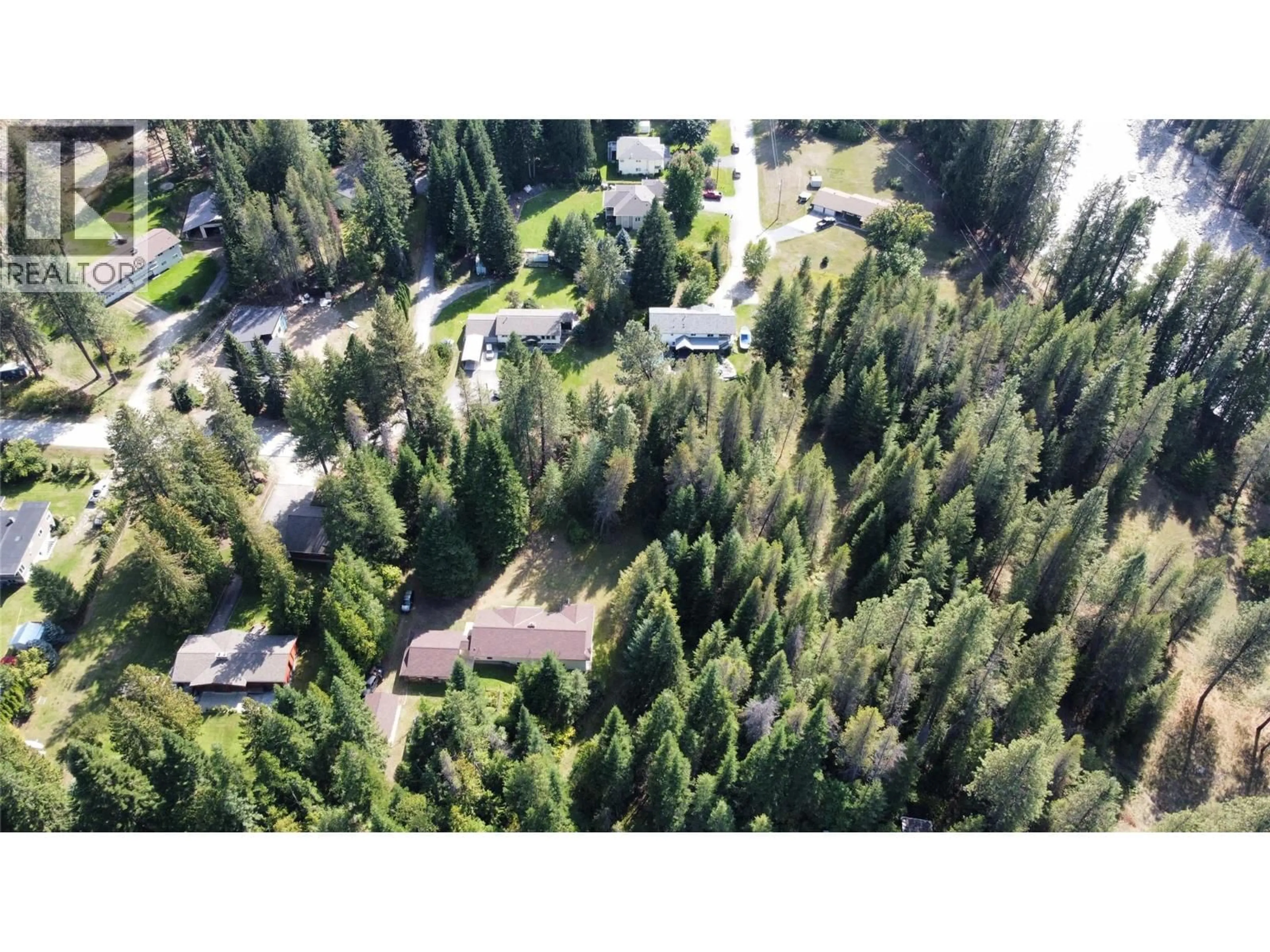 A pic from outside/outdoor area/front of a property/back of a property/a pic from drone, forest/trees view for 1070 WEBB ROAD, South Slocan British Columbia V0G2G0