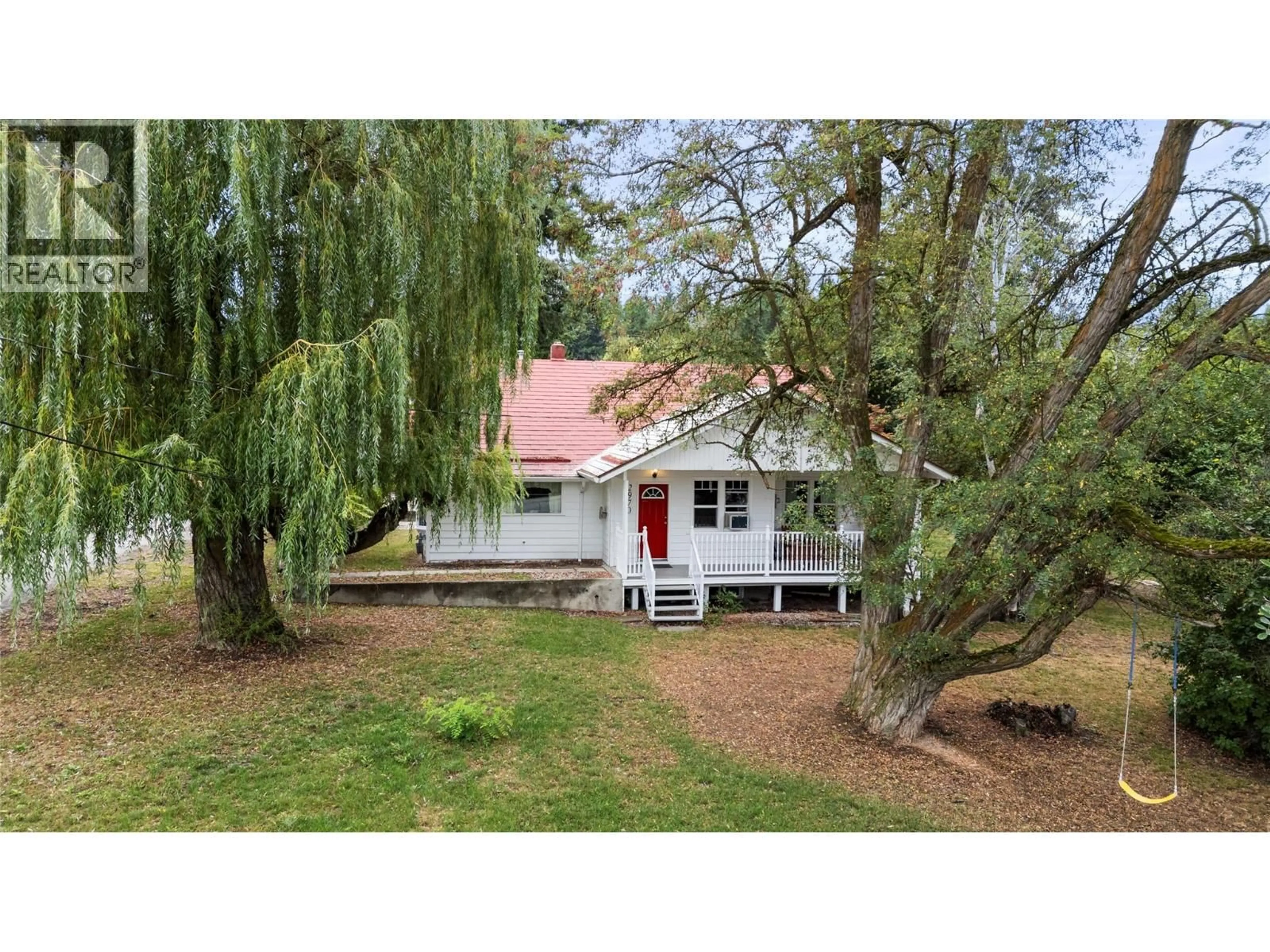 A pic from outside/outdoor area/front of a property/back of a property/a pic from drone, street for 2970 30 STREET NORTHEAST, Salmon Arm British Columbia V1E3G7